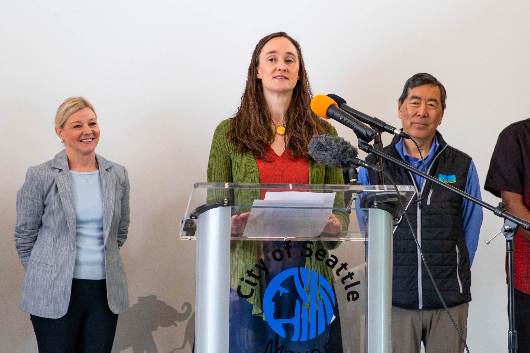 Seattle Mayor Katy Wilson announced free FIFA World Cup tickets for 1,400 local youth at a news conference at the Somali Health Board in Seattle on Wednesday. (Nicole Pasia / The Seattle Times)