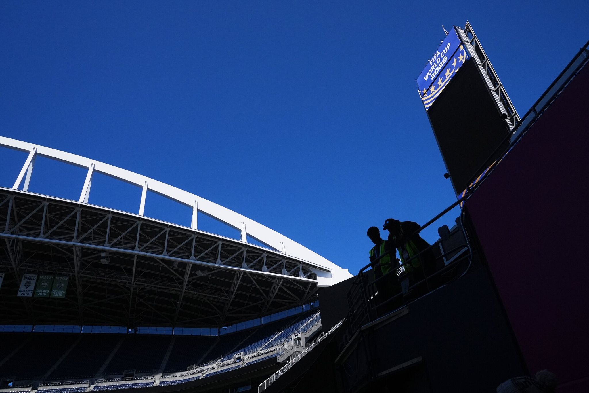 Workers prepare Seattle Stadium, the temporary name for Lumen Field, for the 2026 FIFA Men’s World Cup matches, May 27, in Seattle. (Lindsey Wasson / The Associated Press)