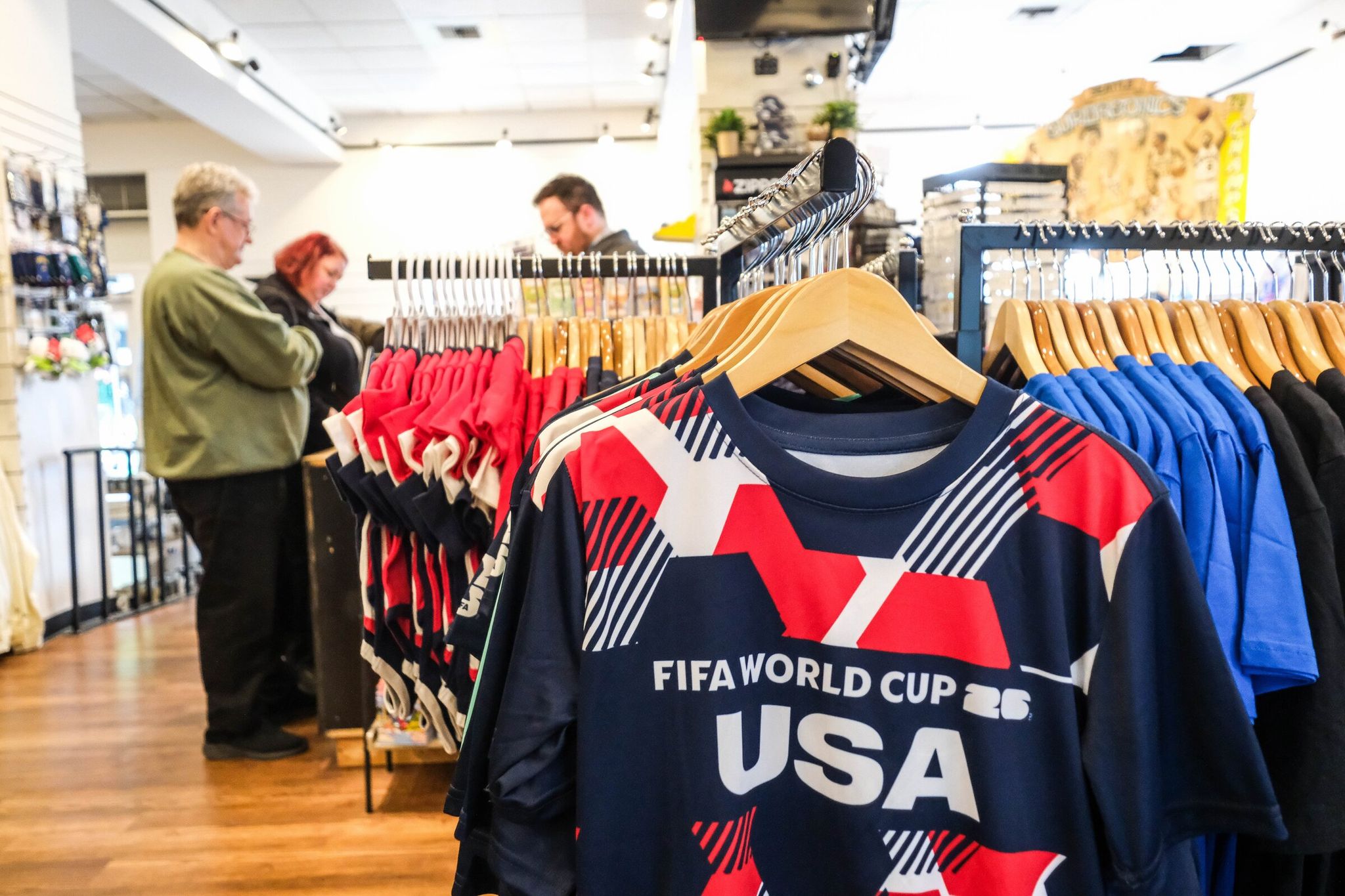 At Simply Seattle on First Avenue downtown, anything related to this summer’s FIFA World Cup Tournament is selling off the shelf, according to store manager Kate Wansley. (Dean Rutz / The Seattle Times)