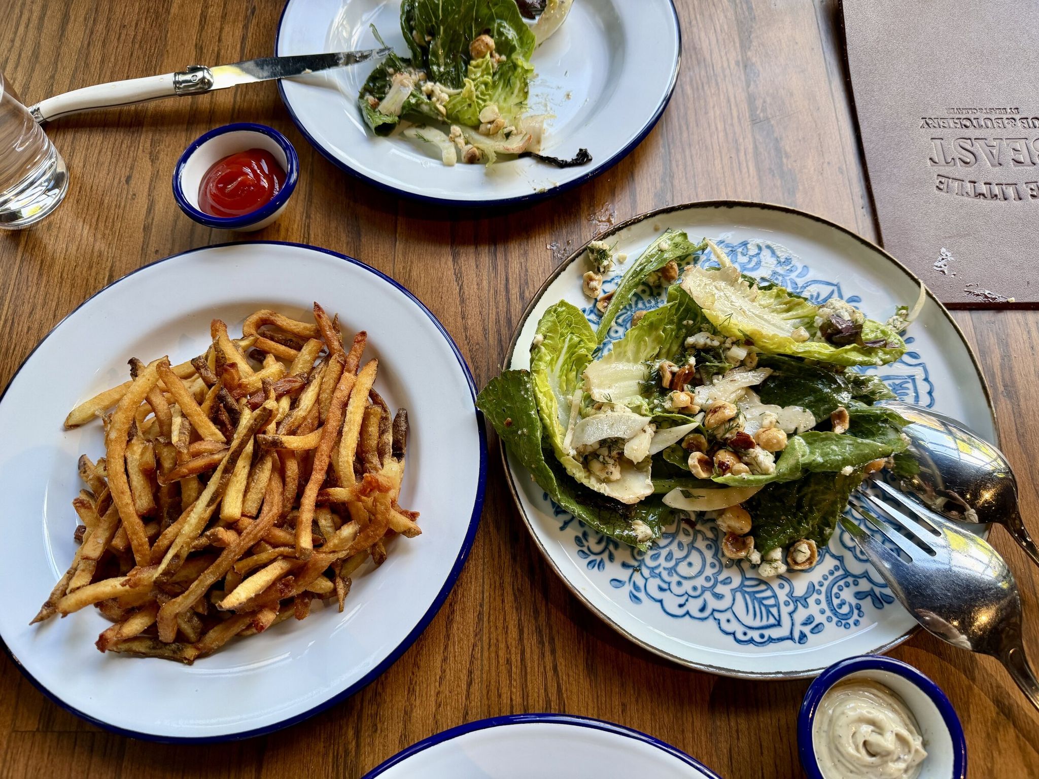 Little Beast in Ballard serves excellent fries and an equally tasty salad. (Margo Vansynghel / The Seattle Times)