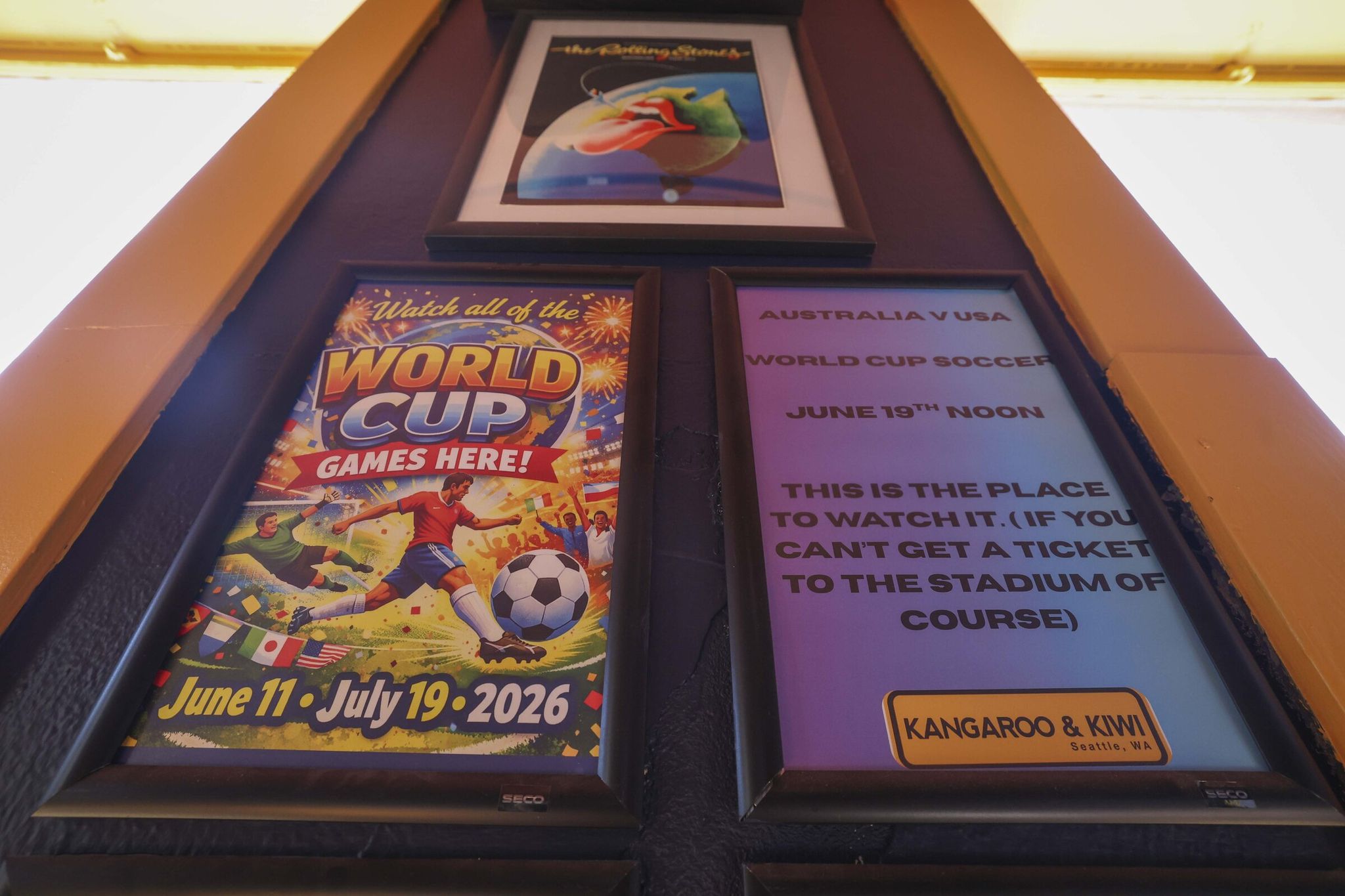 A watch-party sign for World Cup matches spotted at Kangaroo & Kiwi on June 4. (Ivy Ceballo / The Seattle Times)