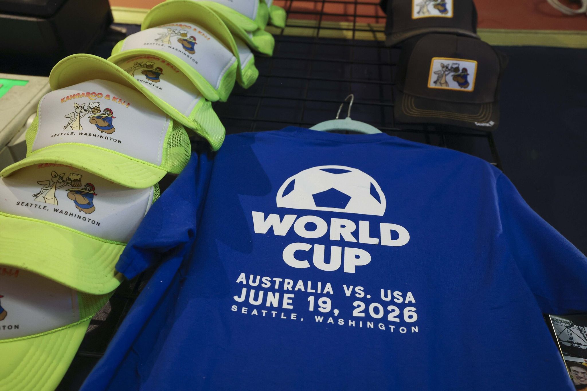 A World Cup shirt is visible among kangaroo- and kiwi-themed merchandise in the pub on June 4. (Ivy Ceballo / The Seattle Times)