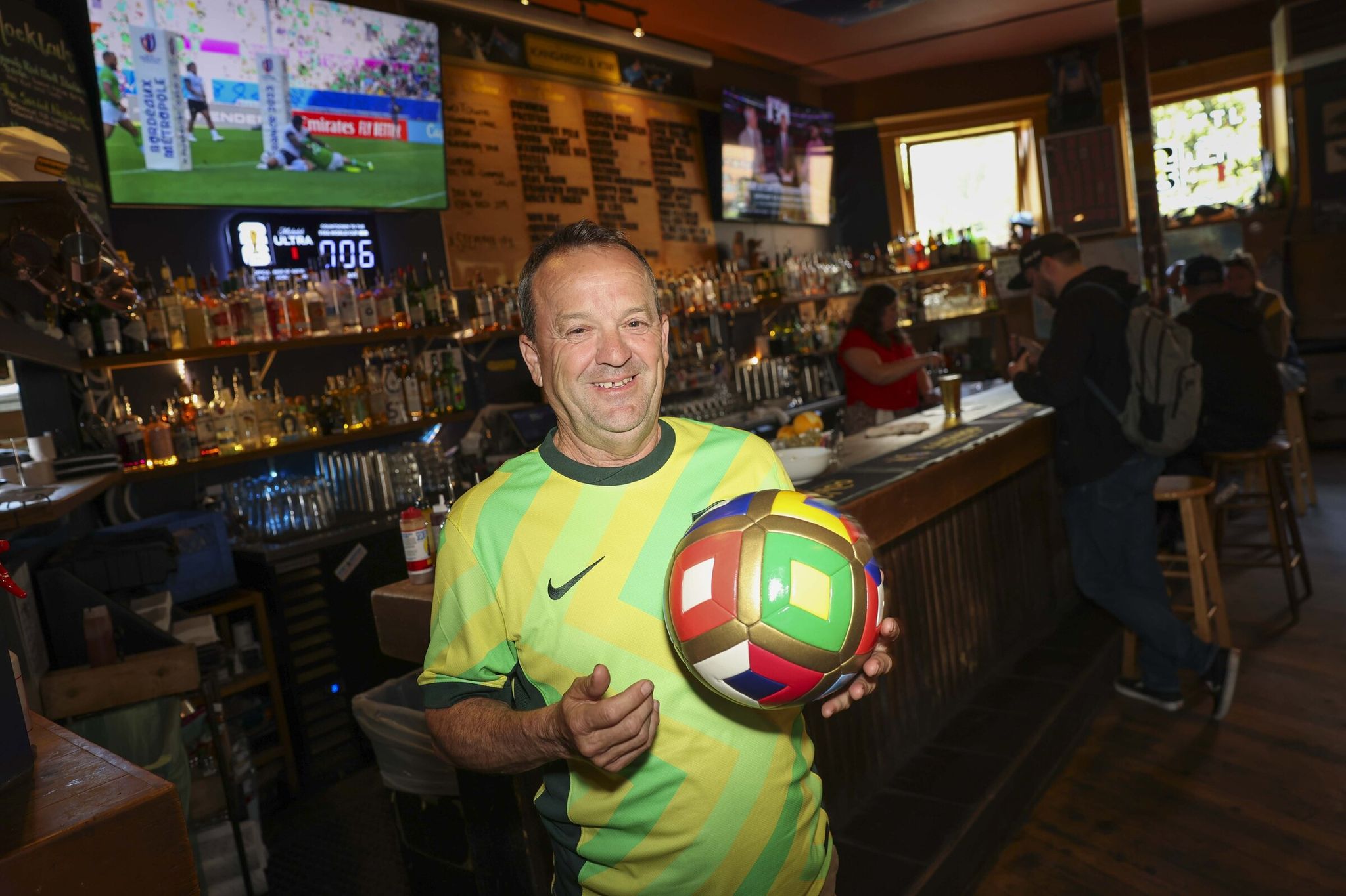 Kangaroo & Kiwi owner Bradley Howe, who turned the Australian–New Zealand–themed pub into a welcoming gathering place. “The pub is life. That’s where everything happens,” he says. (Ivy Ceballo / The Seattle Times)
