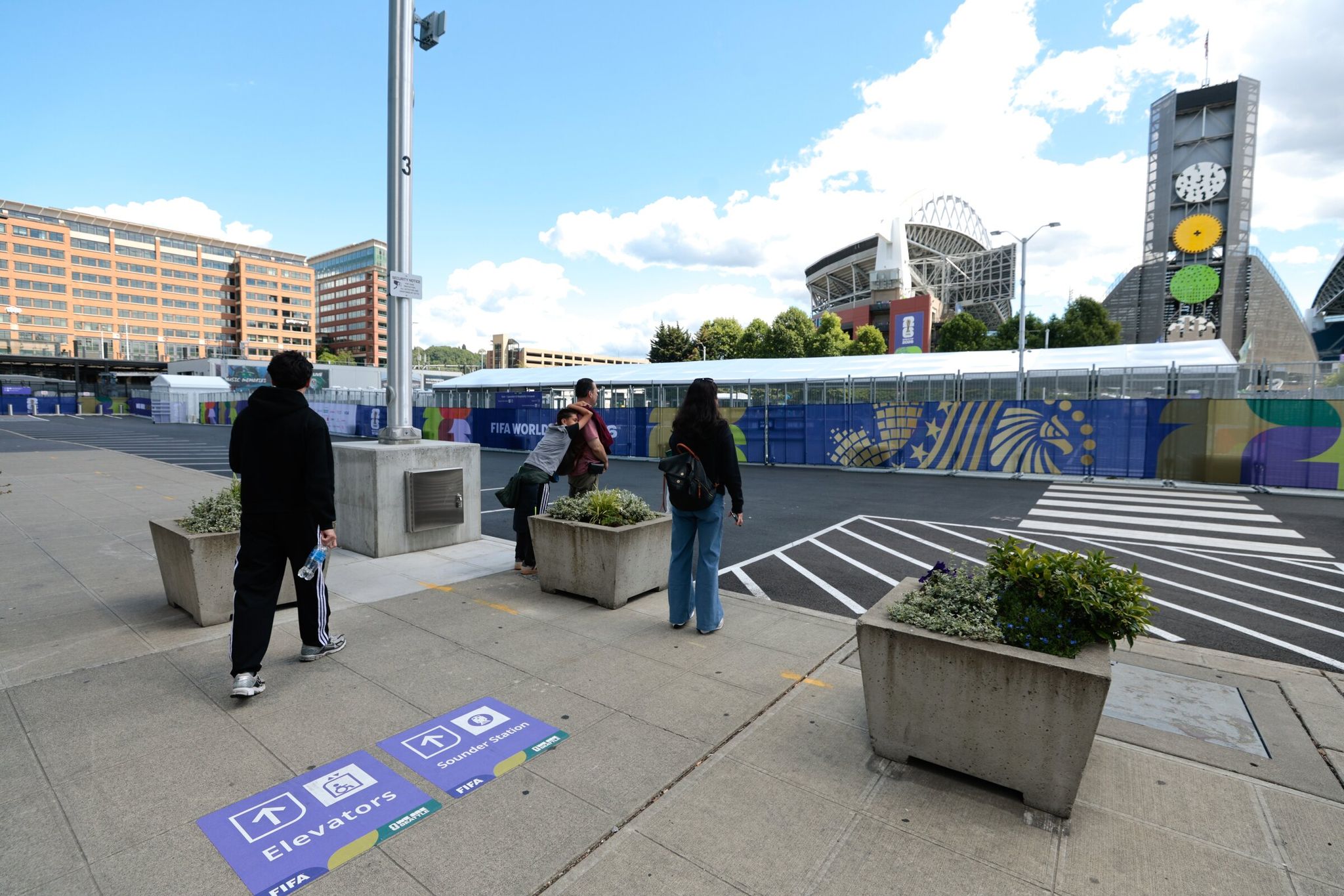 Signs will be abundant during the World Cup as locals and visitors navigate crowds, transit and a car-free area around the stadium. (Karen Ducey / The Seattle Times)