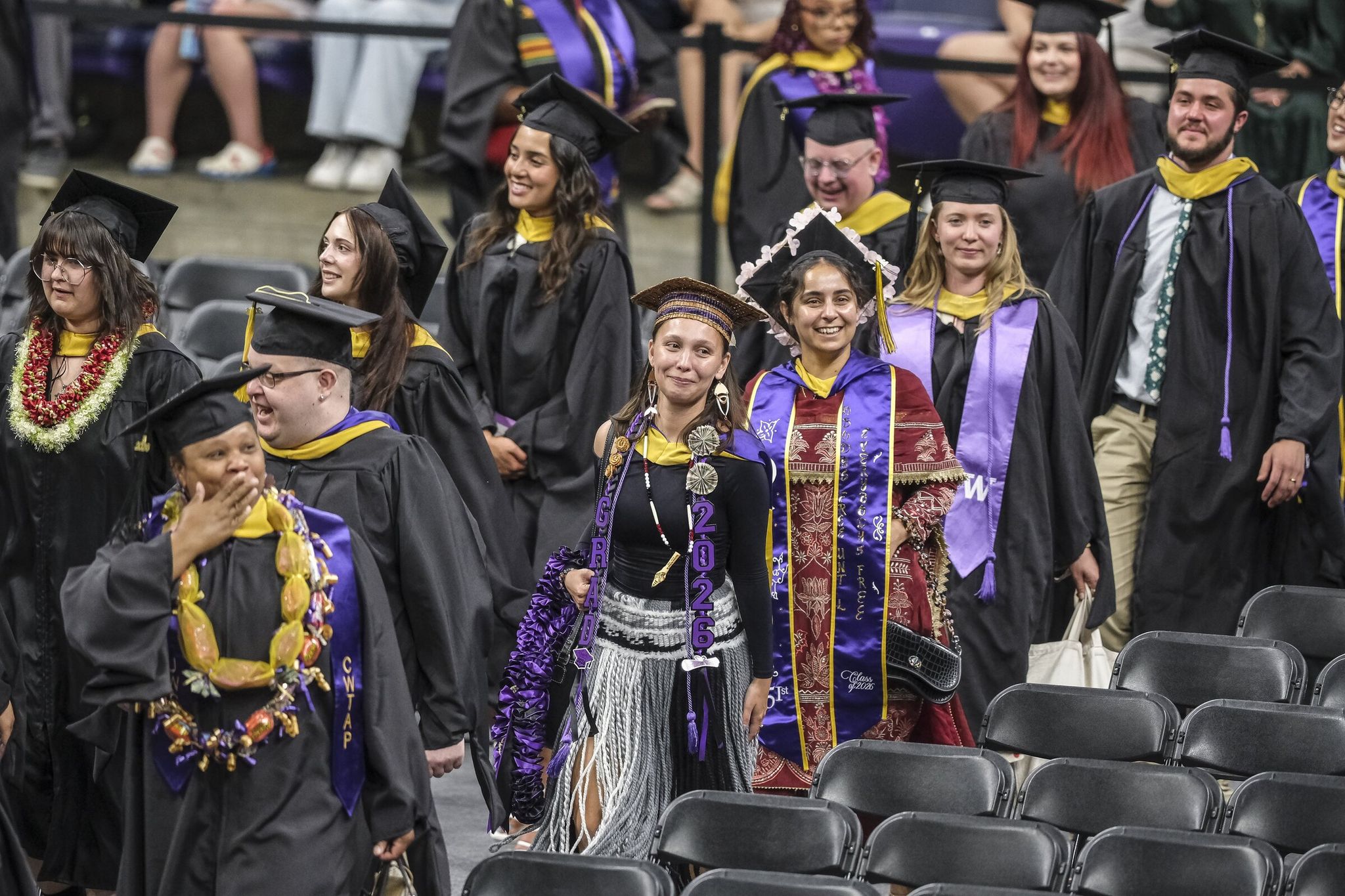 Rosalie Fish joins her fellow graduates at a commencement ceremony for the School of Social Work at the University of Washington. Earning the degree was made possible in part by the Cowlitz Tribe tuition assistance program. (Dean Rutz / The Seattle Times)