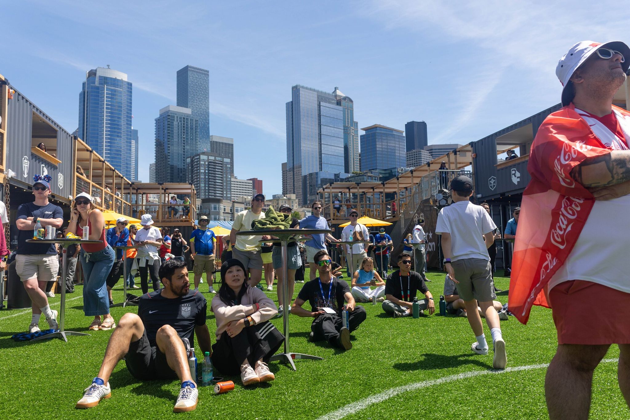 Fans watched the Canada vs. Bosnia and Herzegovina match at the World Cup during the Seattle Soccer Celebration on the floating barge at the waterfront on Friday. (Nicole Pasia / The Seattle Times)