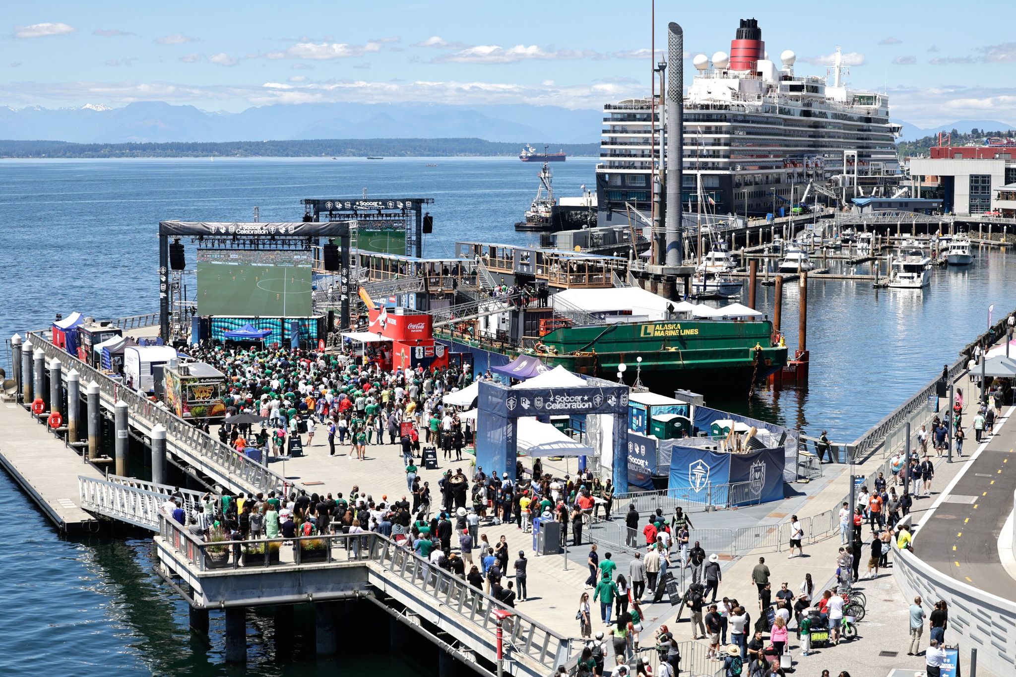 The World Cup kicked off June 10, with the first watch party streaming the match between Mexico and South Africa on the floating barge parked at Pier 62. (Karen Ducey / The Seattle Times)