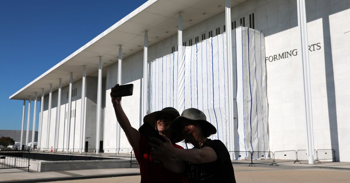 Workers begin removing Trump’s name from the Kennedy Center, hours after a court-ordered deadline