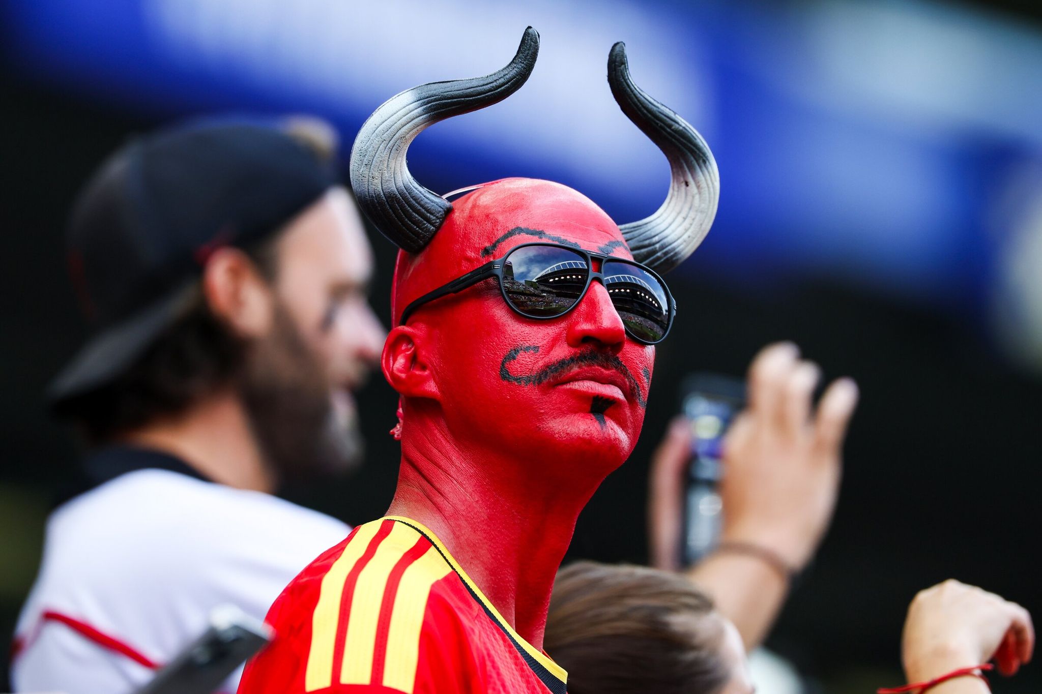 A Belgium fan dressed as a Red Devil gets ready for the team to take on Egypt Monday, June 15, 2026 in Seattle.  (Jennifer Buchanan / The Seattle Times)
