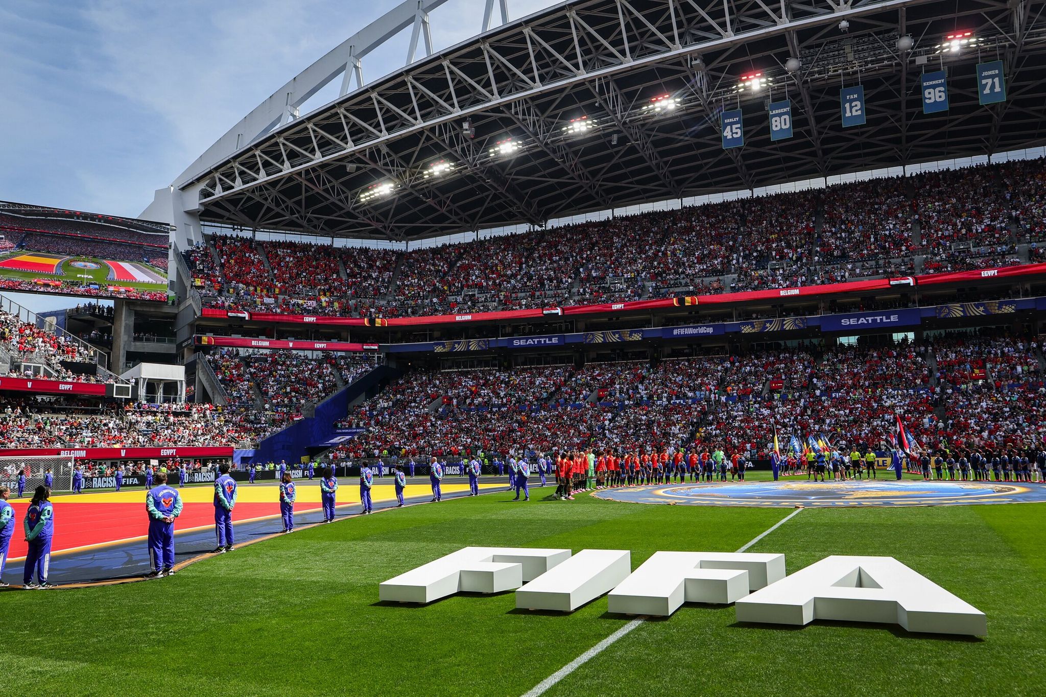 The opening ceremony shows a packed stadium for the Belgium vs. Egypt match — Seattle's first World Cup game on Monday at Lumen Field. (Dean Rutz / The Seattle Times)