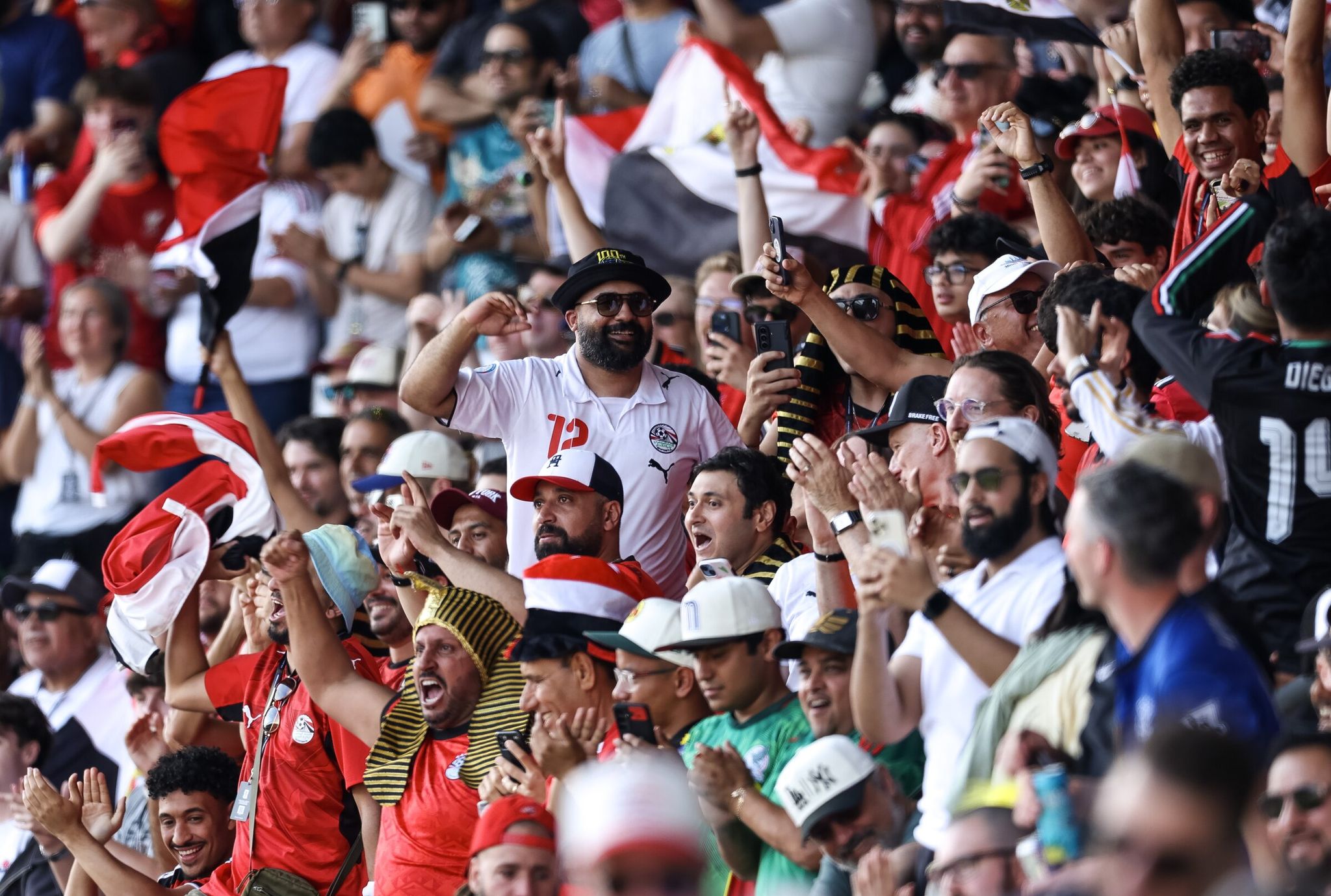 Egypt fans celebrate a goal against Belgium during the World Cup Group G soccer match on Monday, June 15, 2026, in Seattle.  (Nick Wagner / The Seattle Times)