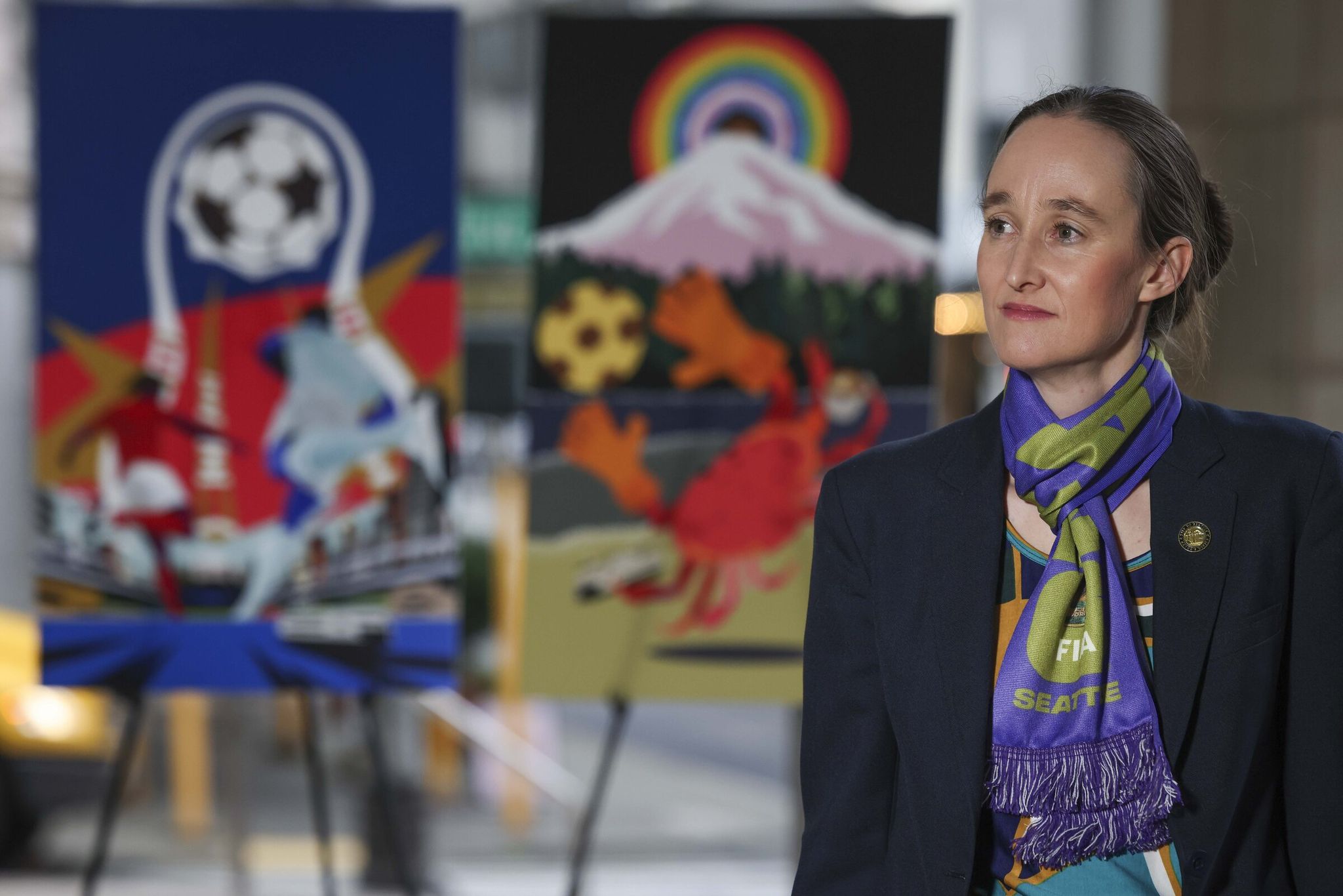 Seattle Mayor Katie Wilson attends a press conference marking the 100-day countdown to the start of the men’s FIFA World Cup at the Westlake Tower in March. (Ivy Seballo / The Seattle Times)