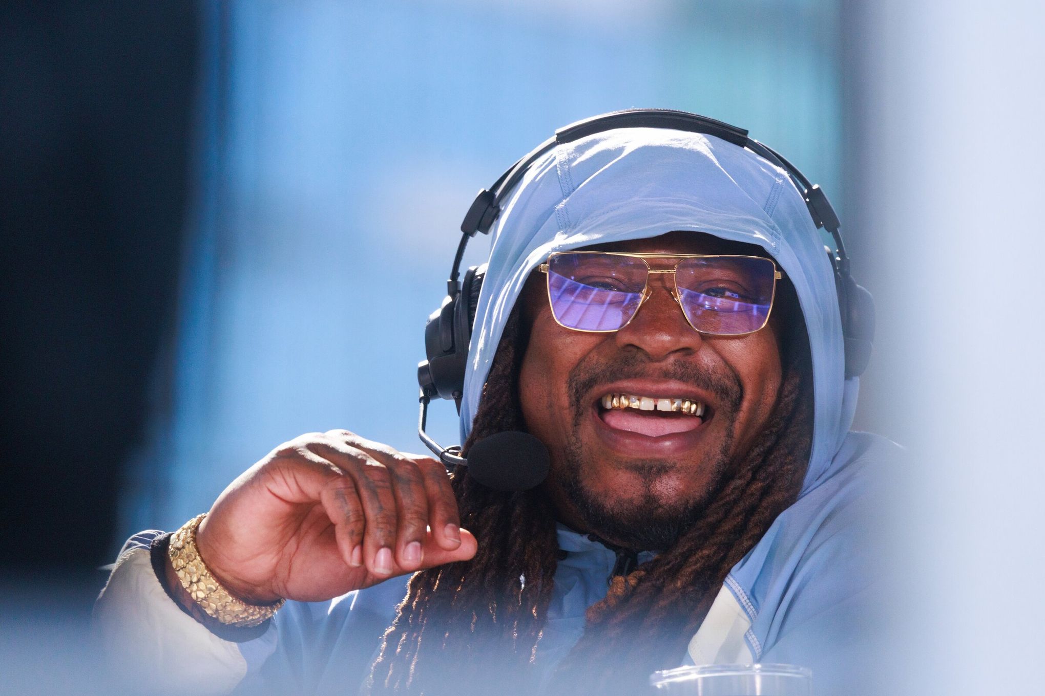 Ex-Seahawk Marshawn Lynch helps energize 'Men in Blazers' crowd | The Seattle Times
