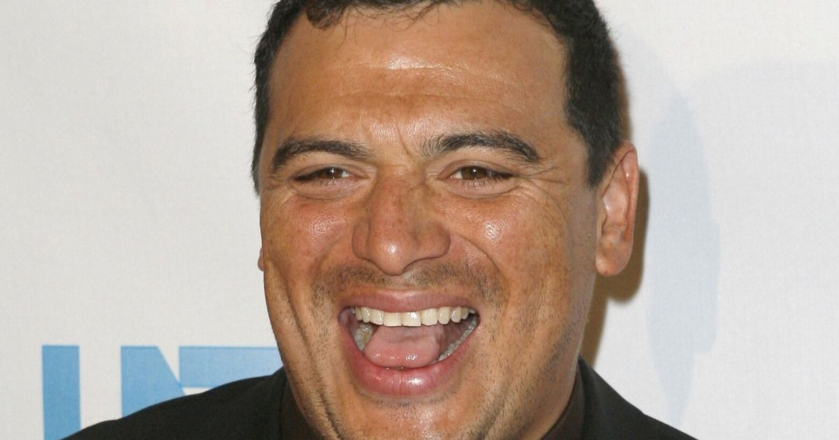 Comedian Carlos Mencia pleads not guilty to 12 felony charges of failure to pay taxes