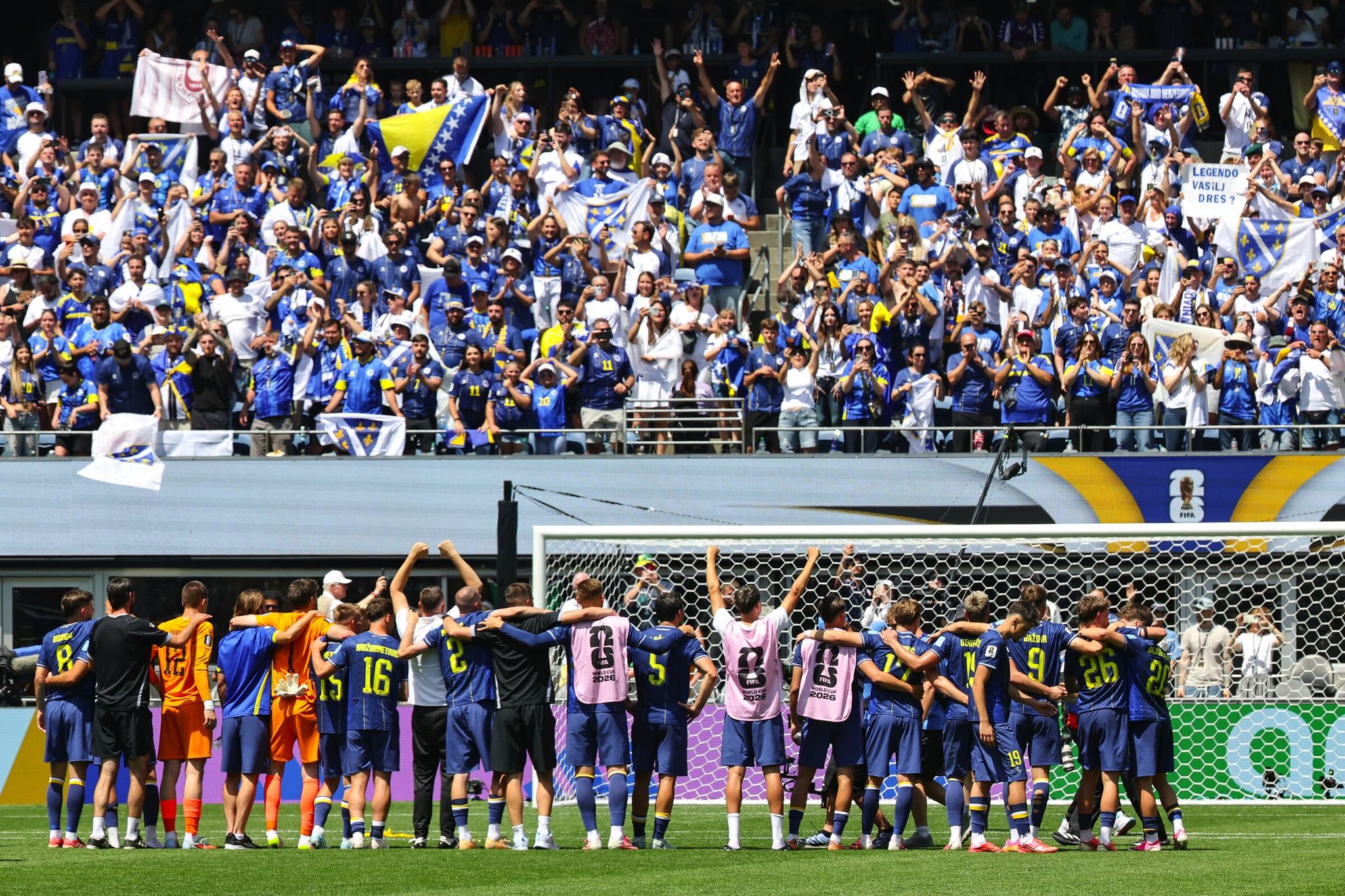 Bosnia and Herzegovina players celebrate with fans after a 3-1 victory over Qatar in the group-stage match of the World Cup at Seattle Stadium on Wednesday, June 24, 2026. (Dean Ratz / The Seattle Times)