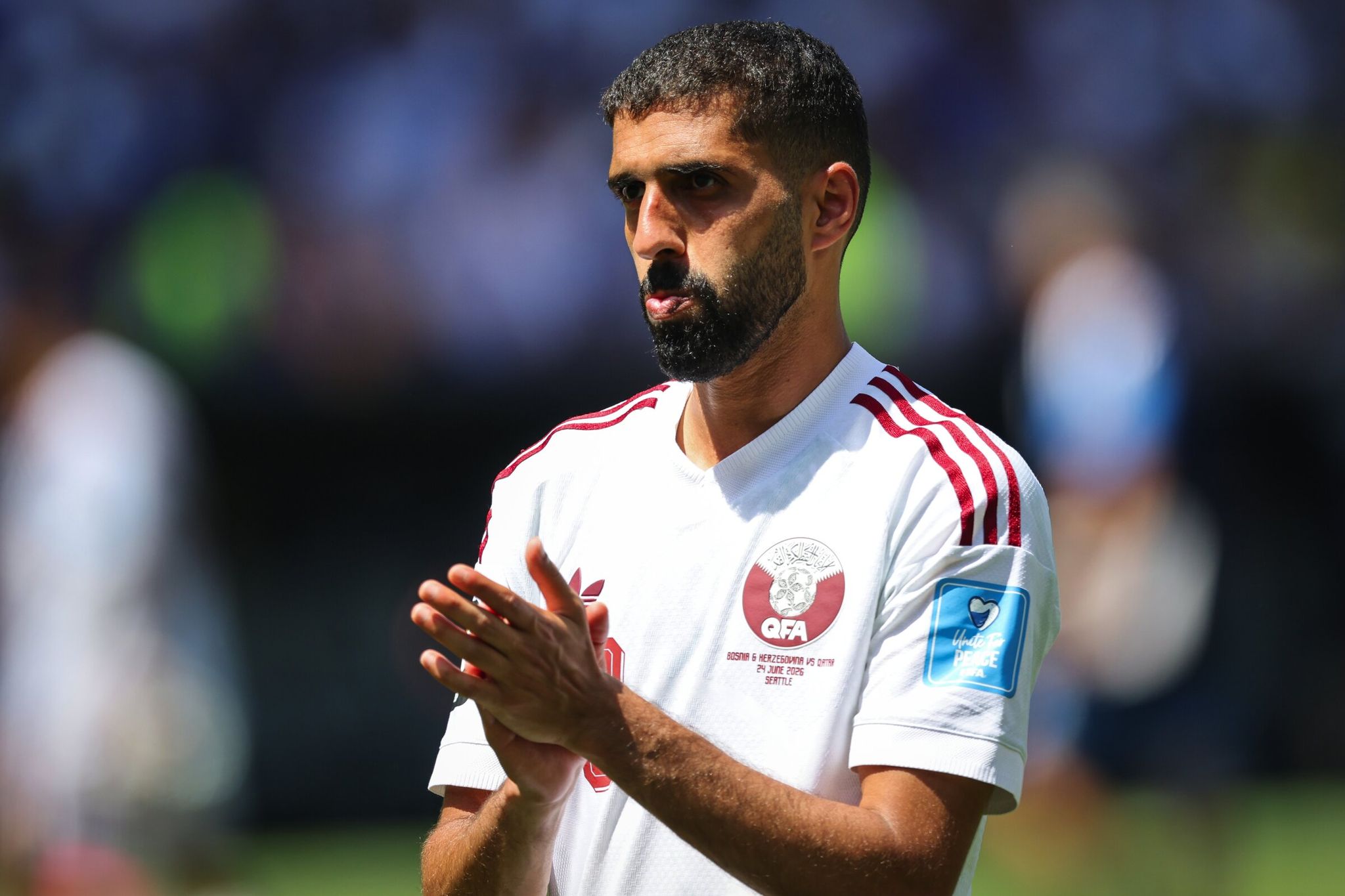 Qatar forward Hassan Al Haydos reacts after a 3-1 loss to Bosnia and Herzegovina in a men’s FIFA World Cup match on Wednesday at a stadium in Seattle. (Dean Rutz / The Seattle Times)