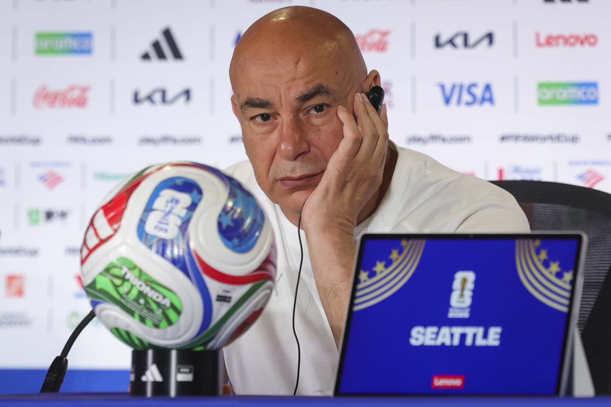 Egypt coach Hossam Hassan, center, speaks during a news conference before their FIFA Men’s World Cup match against Iran at Seattle Stadium. (Ivy Ceballo / The Seattle Times)