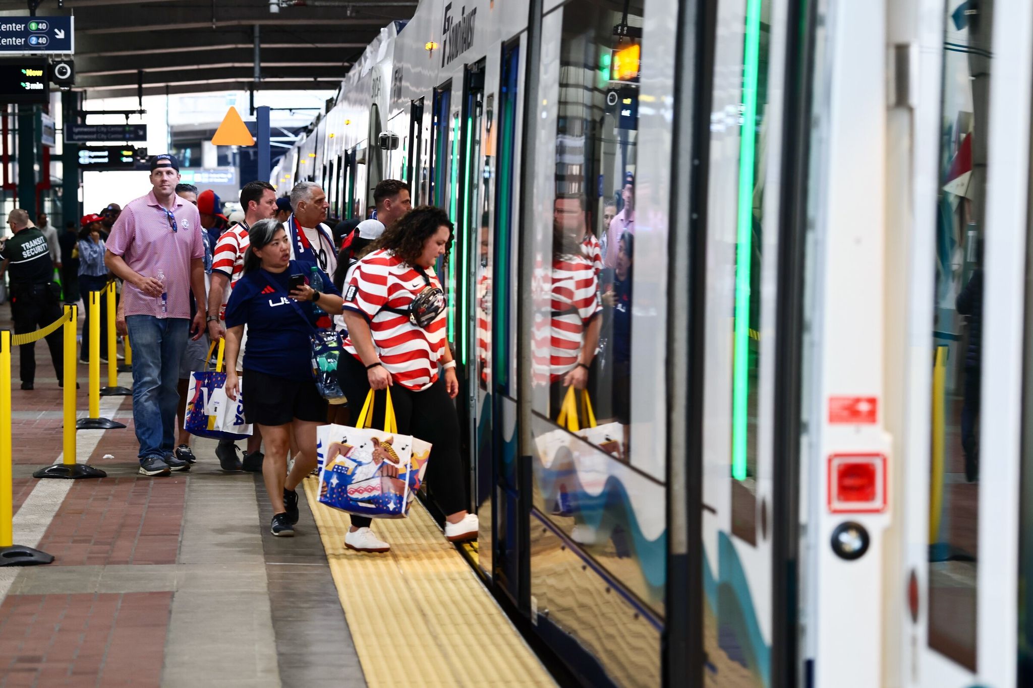 Soccer fans board light rail after the U.S.-Australia World Cup match in Seattle last Friday. (Kevin Clark / The Seattle Times)