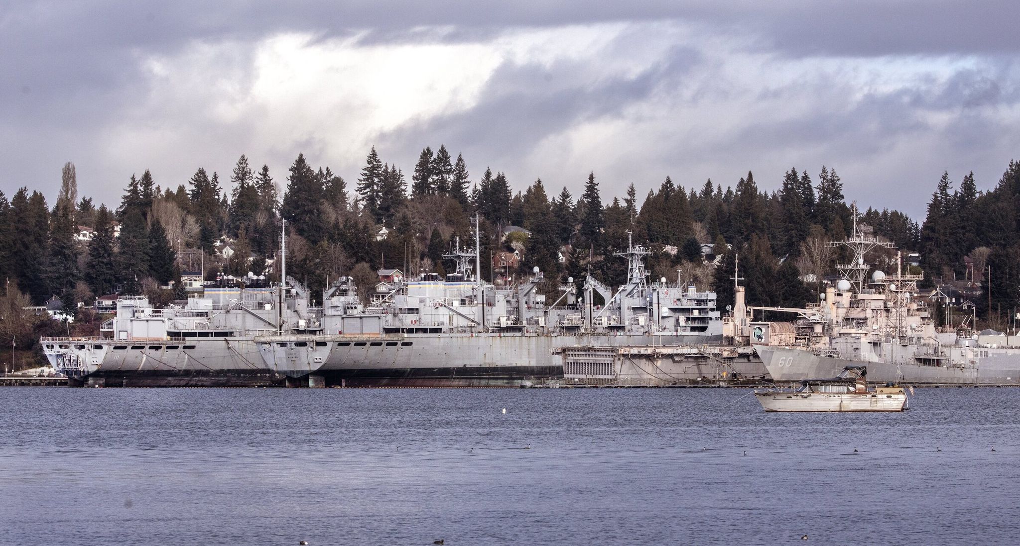 Sea vessels preserved afloat are moored in Sinclair Inlet at the Naval Base Kitsap-Bremerton. (Steve Ringman / The Seattle Times, 2021)