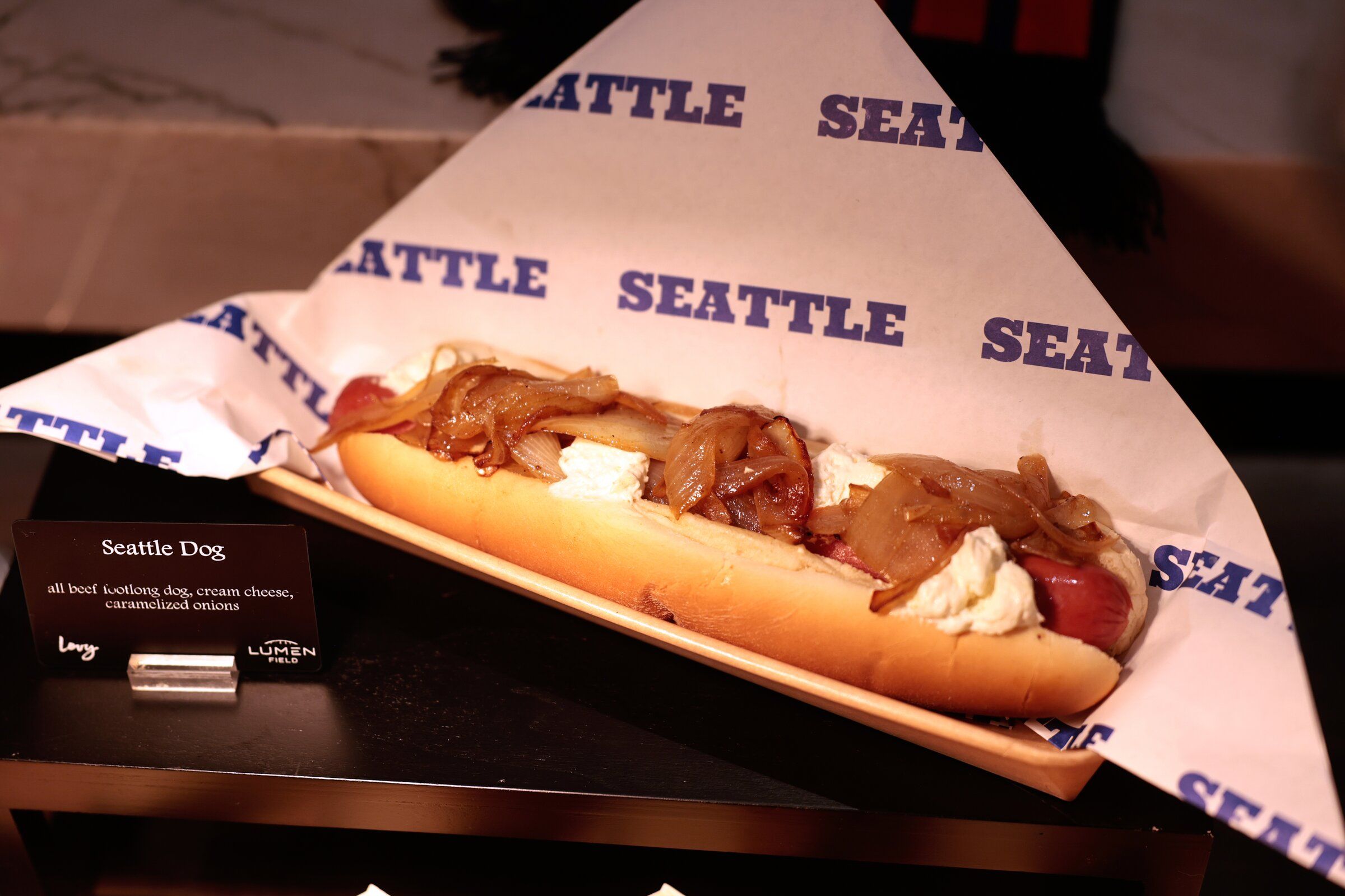 This signature Seattle dog, with cream cheese and caramelized onions, was named the best regional hot dog in the U.S. in a New York Times taste test. (Karen Ducey / The Seattle Times)