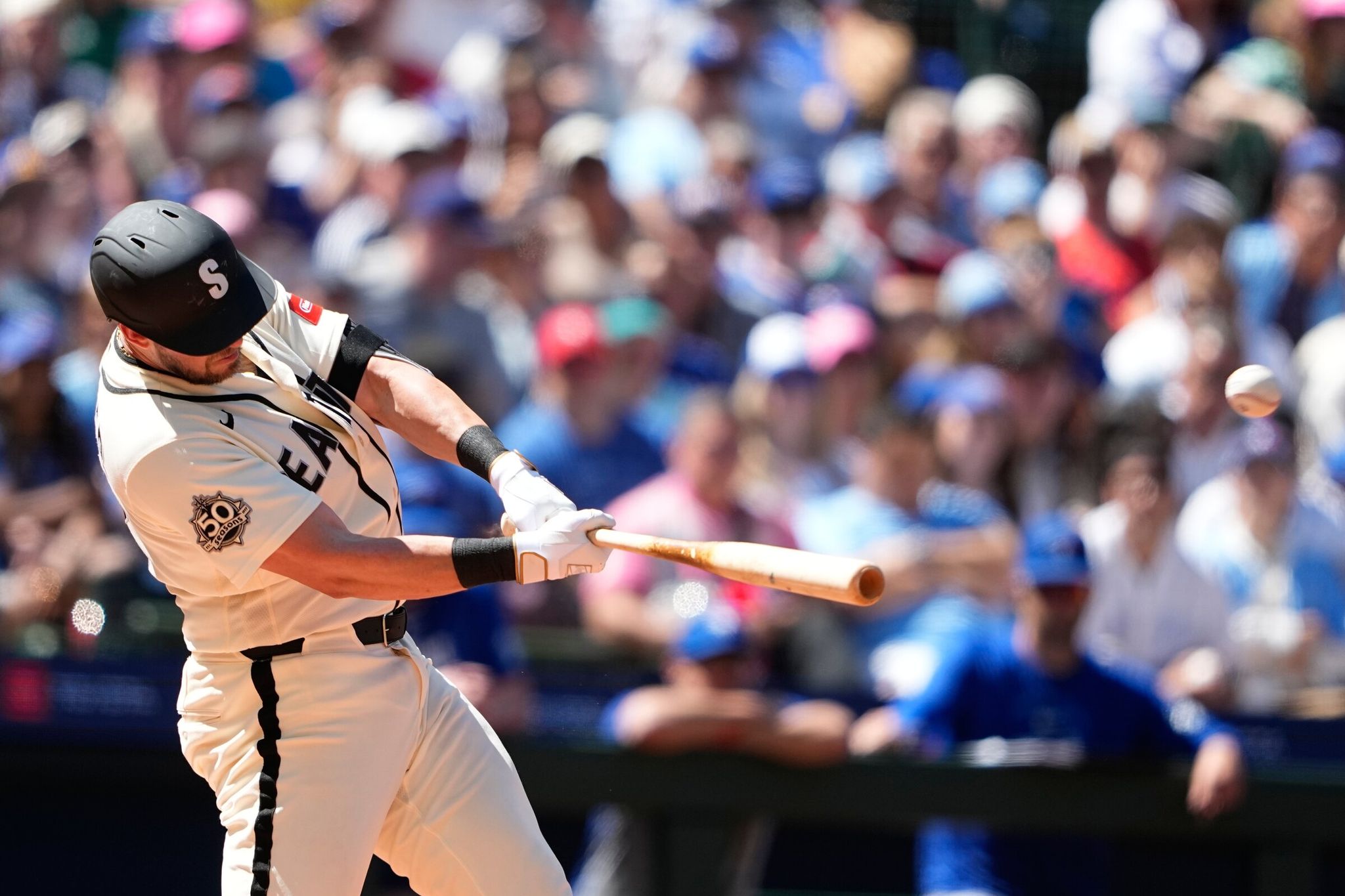 Mitch Garver of the Seattle Mariners hits a two-run home run against the Toronto Blue Jays in the fourth inning of a baseball game on Sunday, July 5, 2026, in Seattle. (Lindsey Wasson / AP Photo / Lindsey Wasson)