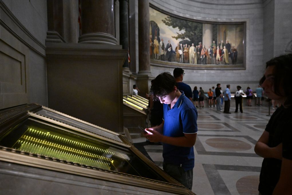 Why the nation's founding document is marred by stains, a mysterious handprint