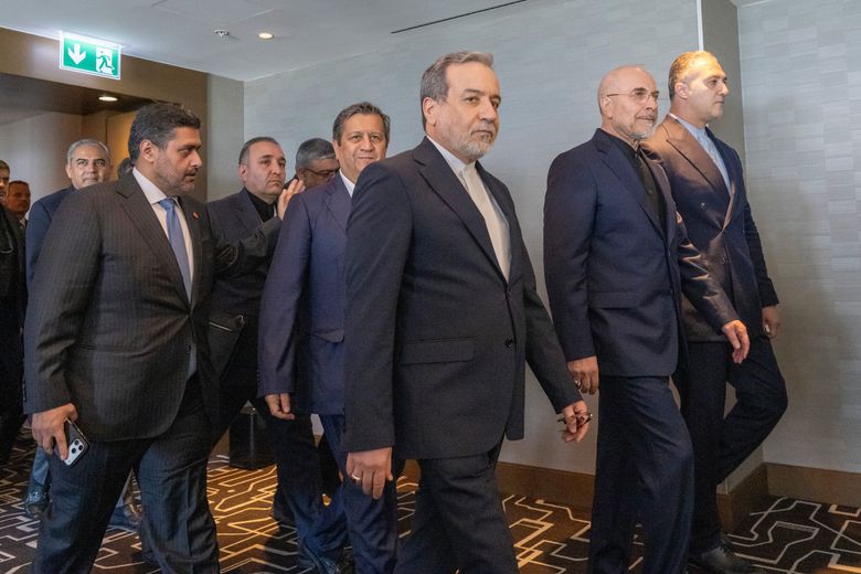Minister of Foreign Affairs of Iran, Seyyed Abbas Araghchi, 3rd from right, and Speaker of the Islamic Parliament of Iran, Mohammed Bagher Ghalibaf, 2nd from right, with the Delegation of Iran at the Lake Lucerne Summit at the Buergenstock resort in Obbuergen, near Lucerne, Switzerland, Sunday, June 21, 2026. (Urs Flueeler, Pool Photo via AP)