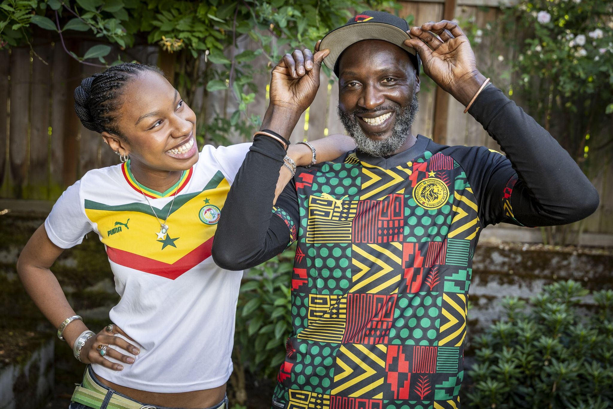 Kiné Seck and her father, Cheikh Yirim Seck, a Senegalese American and longtime Central District resident, will attend the Senegal vs. Belgium World Cup game in Seattle on Wednesday with their extended family. (Kevin Clark / The Seattle Times)