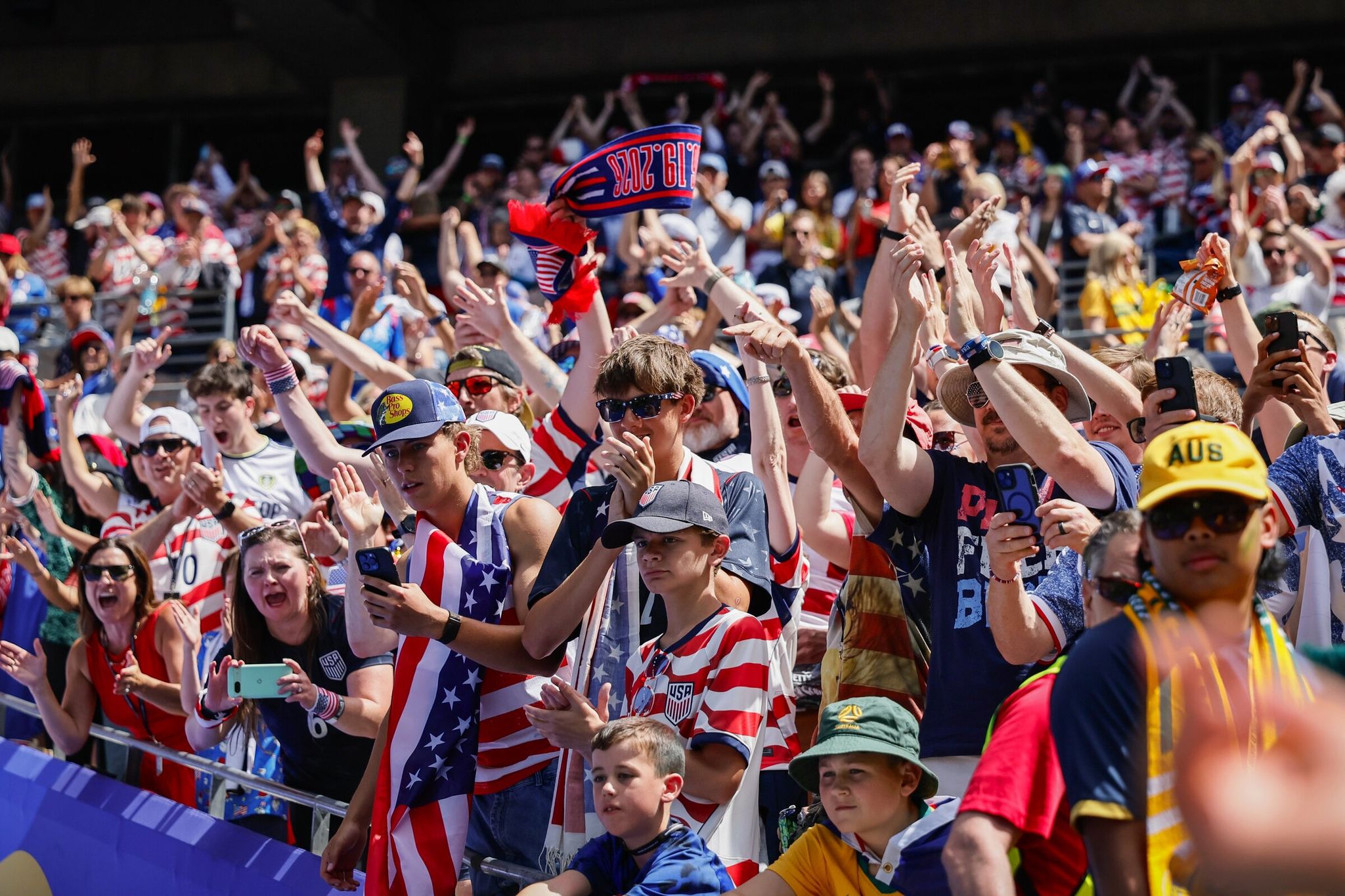 U.S. fans celebrate after a 2-0 victory over Australia during the group stage match of the World Cup in Group D on June 19, 2026, in Seattle. (Jennifer Buchanan / The Seattle Times)