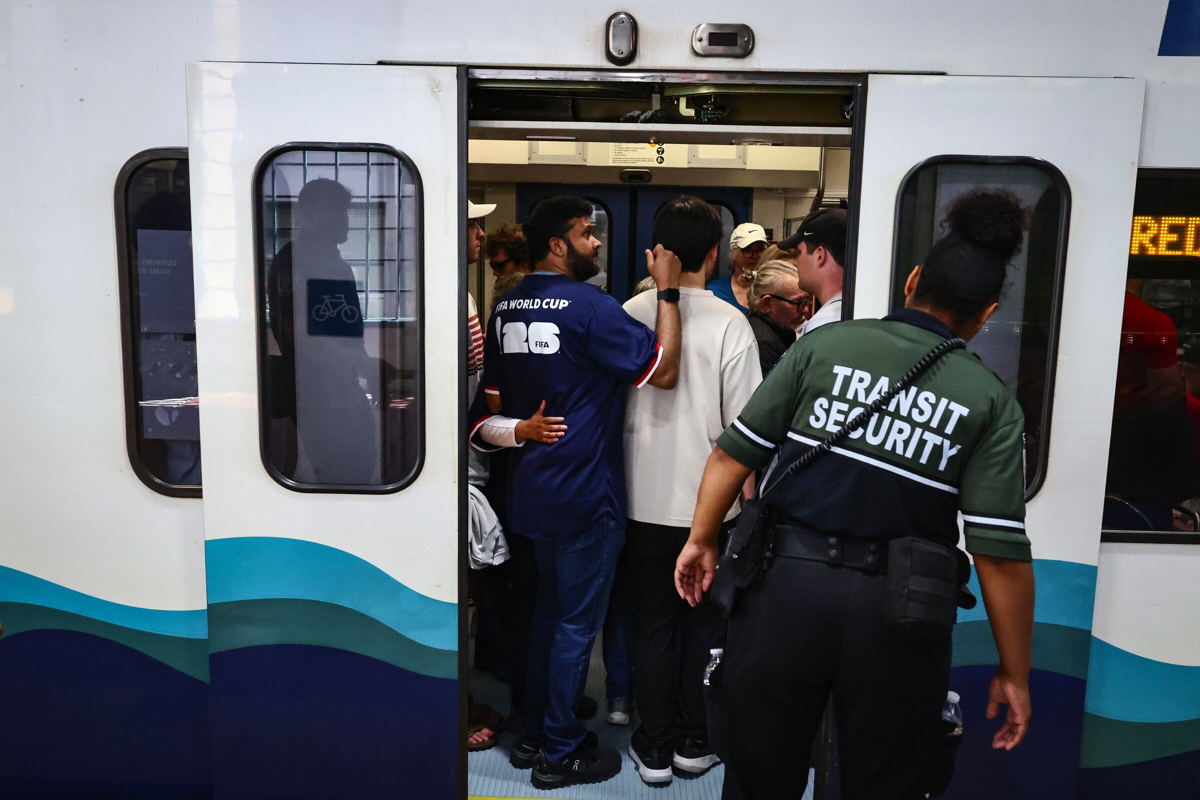 Light rail trains on June 19 overflow at International District/Chinatown Station for the FIFA World Cup match between the U.S. and Australia. Ridership surged again as the Seattle Mariners played the Boston Red Sox later that day. (Kevin Clark / The Seattle Times)