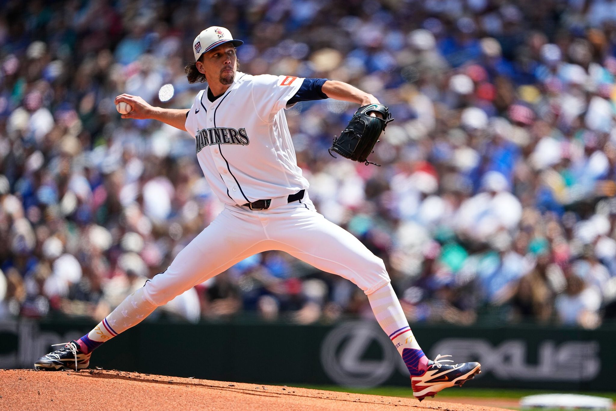 Seattle Mariners starting pitcher Logan Gilbert throws against the Toronto Blue Jays during the first inning of a baseball game, Saturday, July 4, 2026, in Seattle. (AP Photo/Lindsey Wasson)