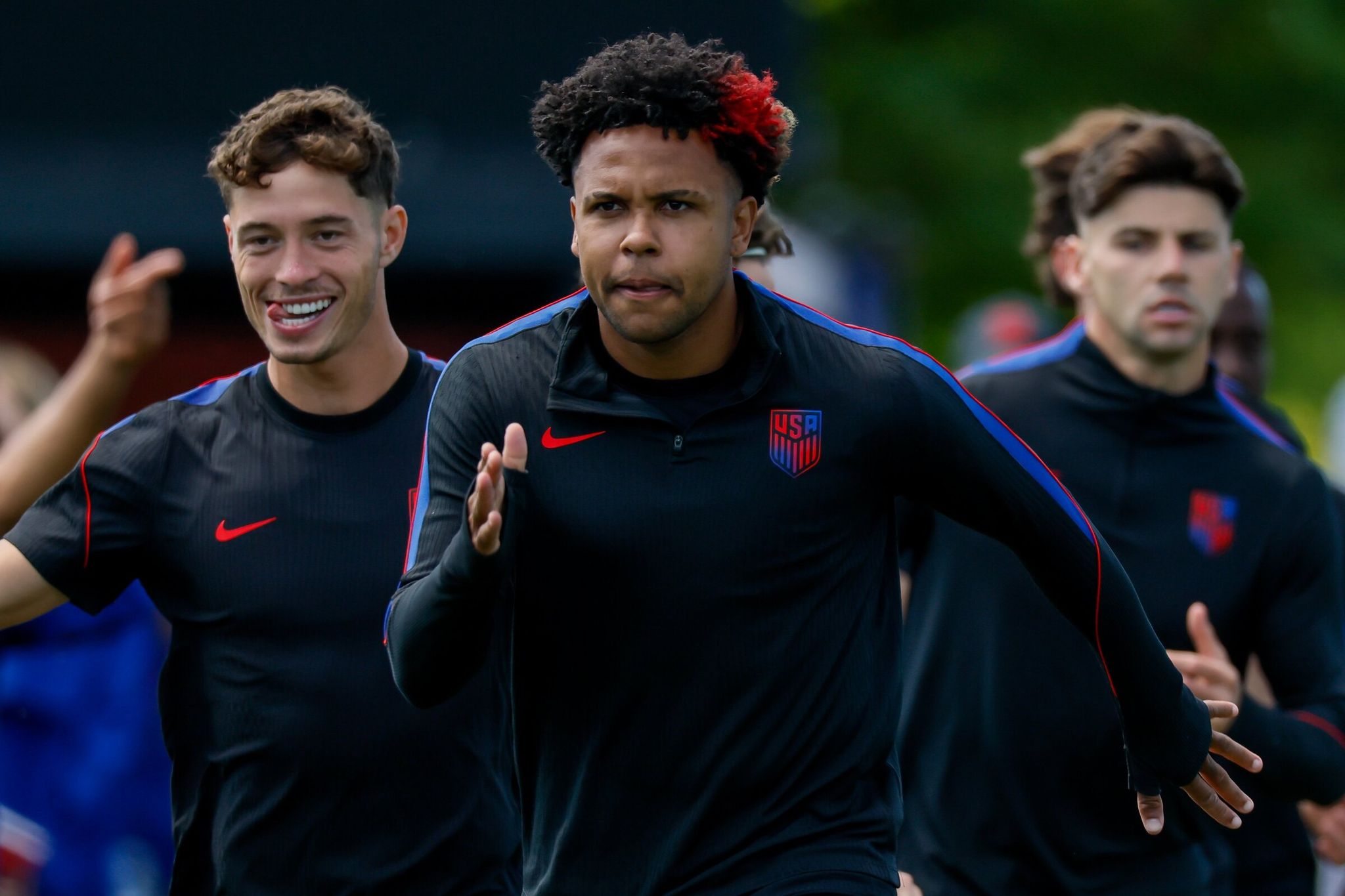 Team USA midfielder Weston McKennie runs during training Sunday. (Jennifer Buchanan / The Seattle Times)