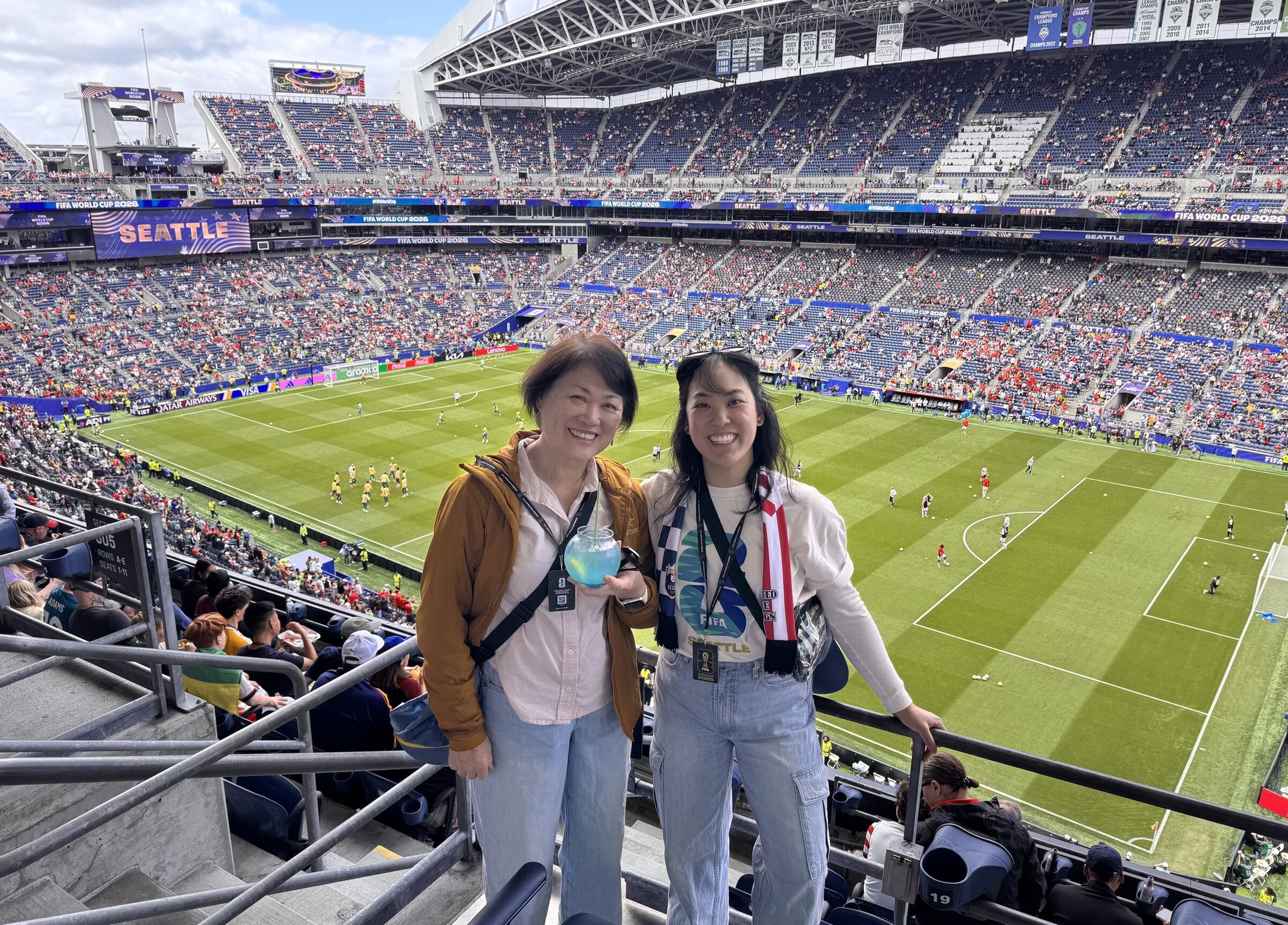 Heng Woon, left, and Christina Woon at Seattle Stadium. When Heng’s daughter surprised her with World Cup tickets, Heng said she was “so excited, I couldn’t believe it.” (Courtesy of Christina Woon)