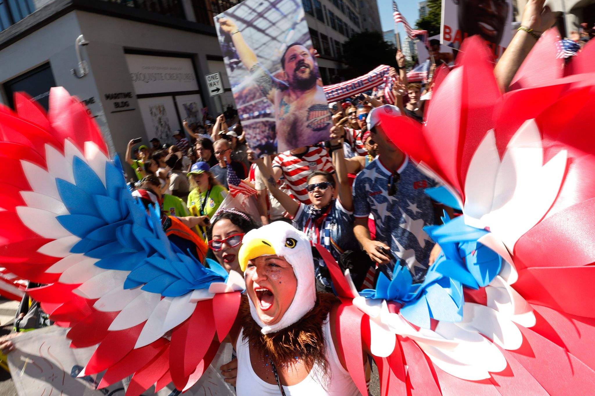 Nicole Bure from Chicago dressed in an eagle outfit marches to the FIFA World Cup 2026 Round of 16, USA and Belgium match in Seattle on Monday, July 6, 2026.  (Karen Ducey / The Seattle Times)