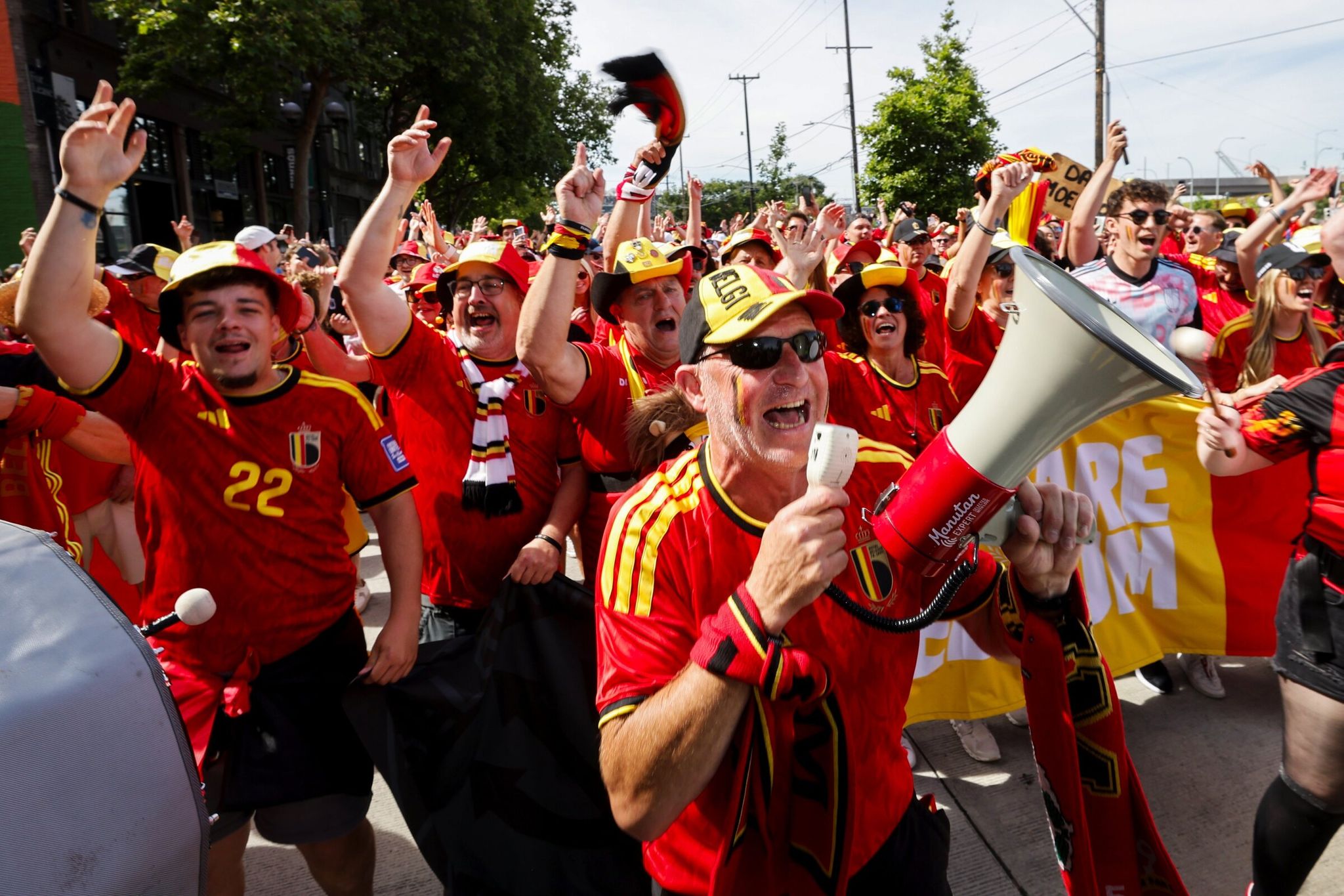 Belgian fans march from Victory Hall to Seattle Stadium before the World Cup match Belgium vs. Egypt in Seattle on Monday, June 15. (Karen Ducey / The Seattle Times)