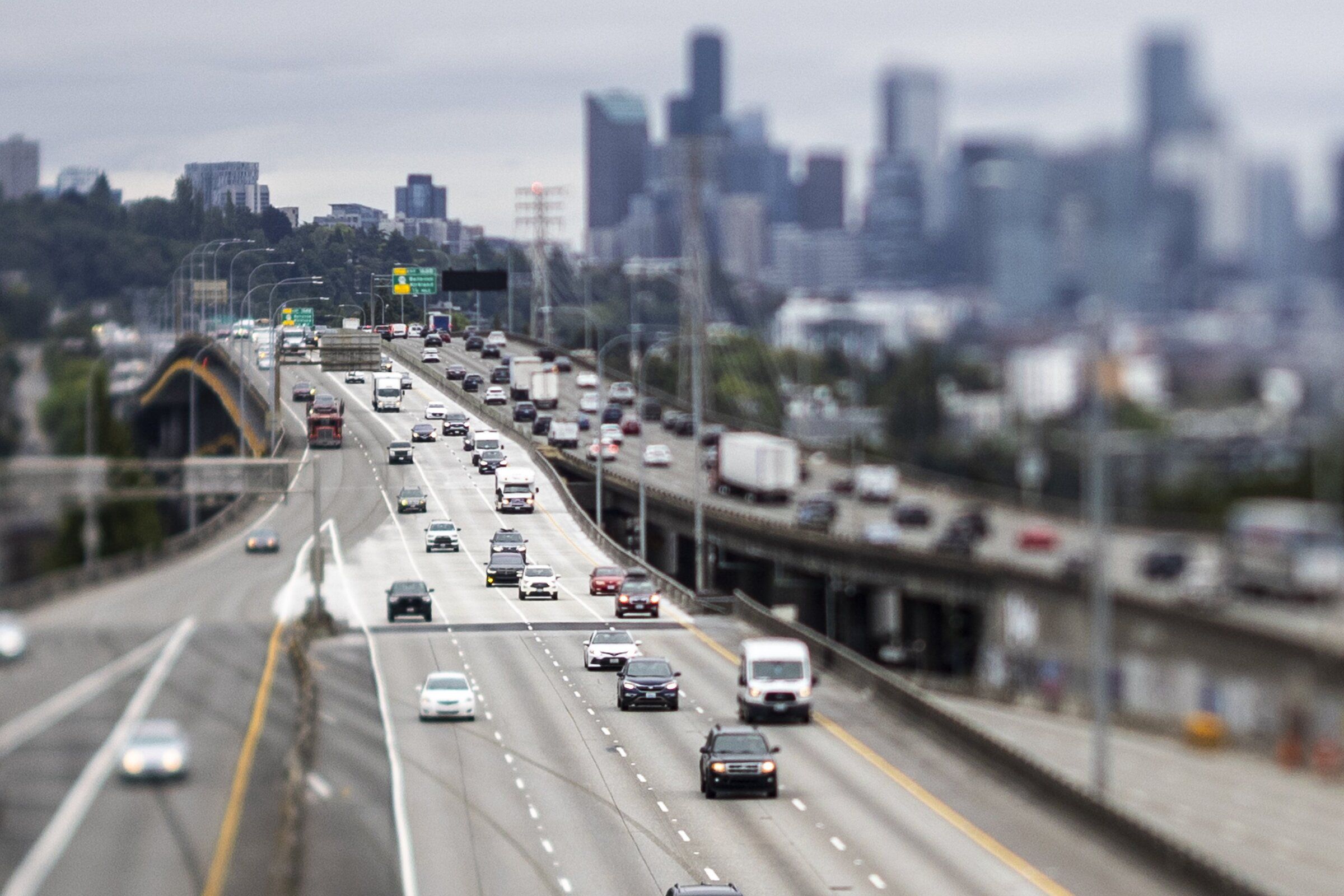 Two left lanes of northbound Interstate 5 are brighter where new concrete was just installed on the Ship Canal Bridge. After a World Cup break, the right two lanes will be resurfaced between mid-July and December. (Kevin Clark / The Seattle Times)