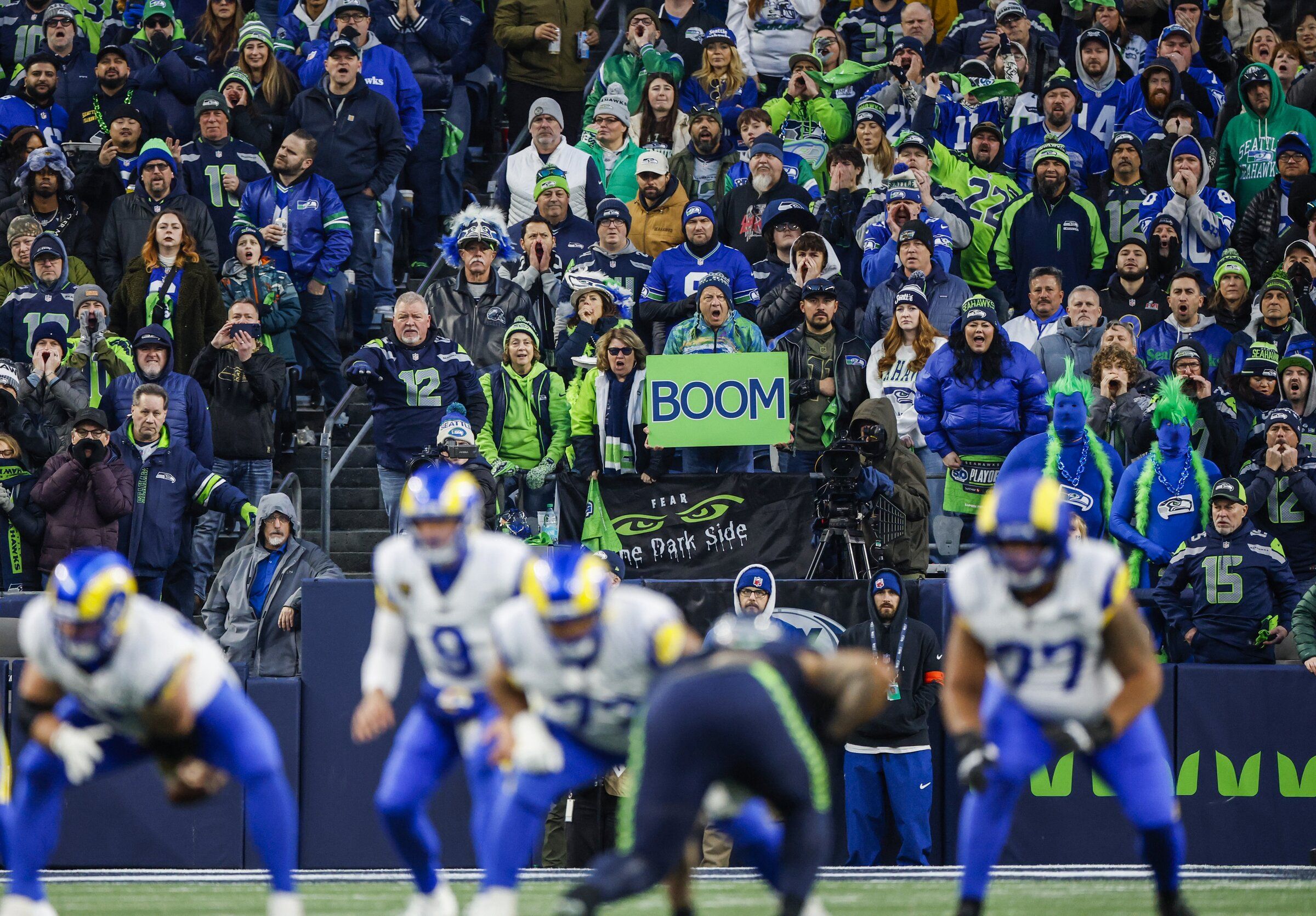 Seattle Seahawks’ fans are out of their seats cheering during the NFC Championship game against the Los Angeles Rams at Lumen Field Sunday, Jan. 25, 2026 in Seattle. (Jennifer Buchanan / The Seattle Times)