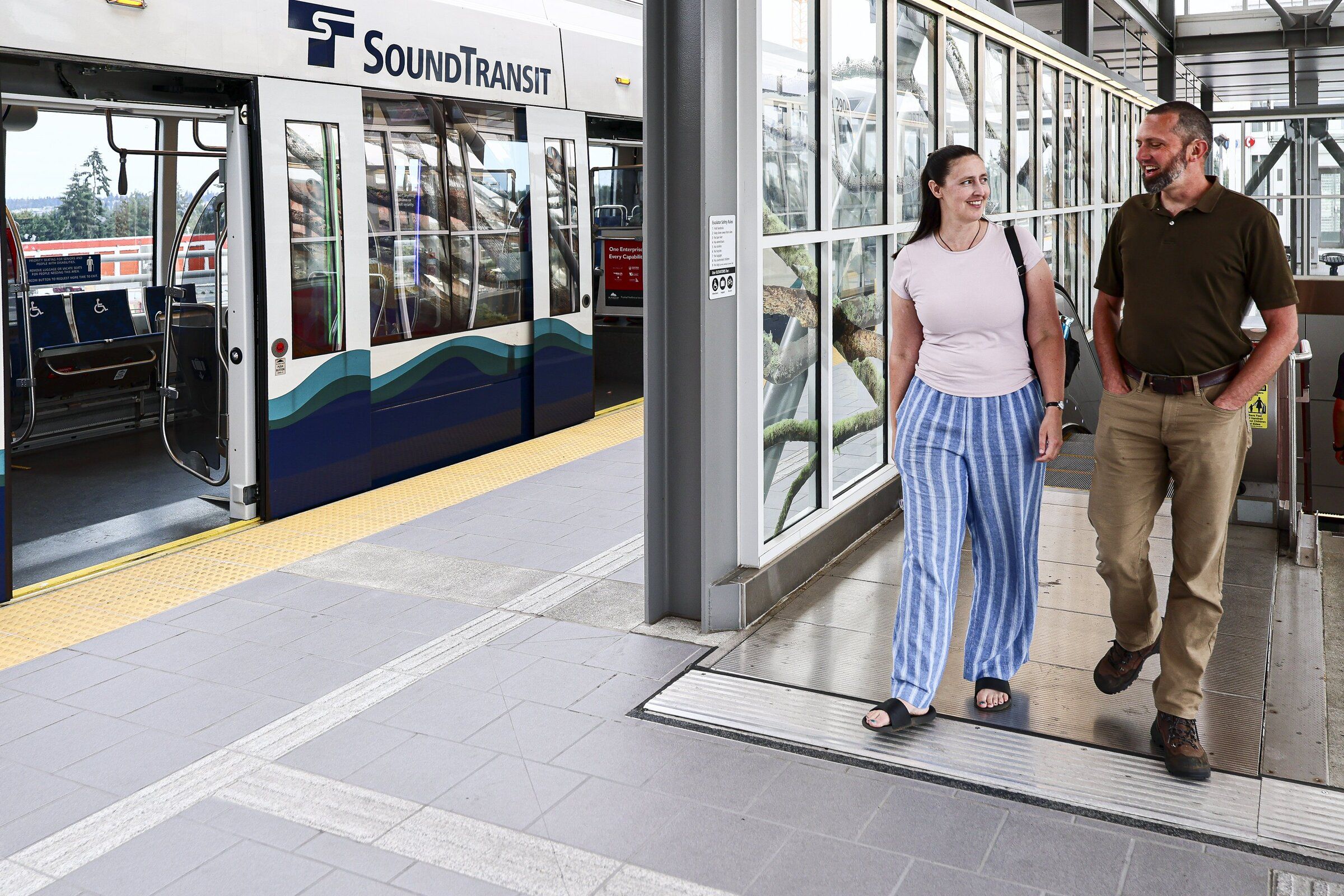 Dusty and Charlene Wilson of Kent use their proximity to the light rail to ride to Seattle for theater shows and sports. “We were always just drivers, and then gas hit $6 a gallon,” Dusty Wilson says. (Kevin Clark / The Seattle Times)