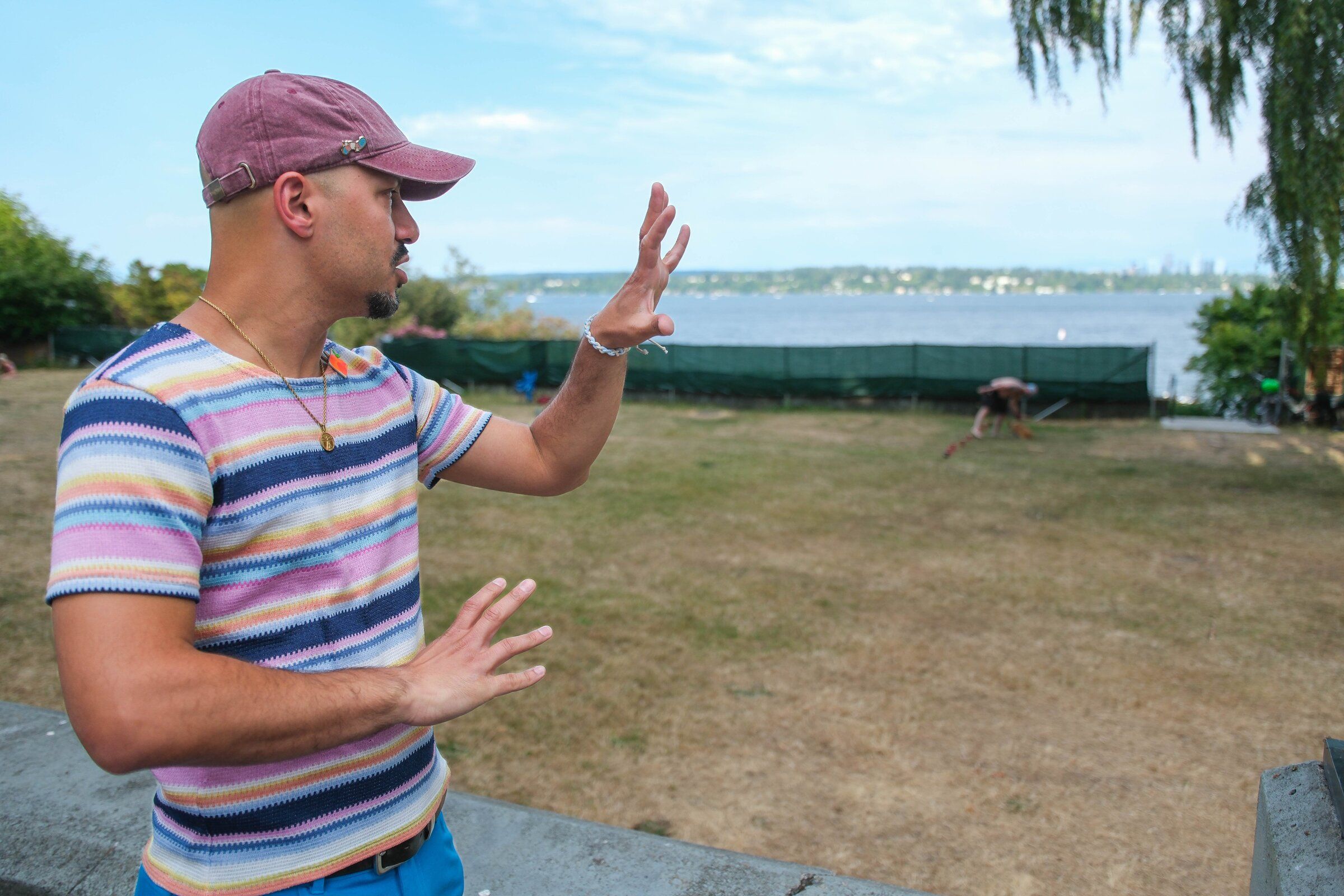 Jesse Miranda, with Friends of Denny Blaine, talks about Wednesday’s court ruling requiring the city to do more to prevent “lewd” behavior at the public beach. (Dean Rutz / The Seattle Times)