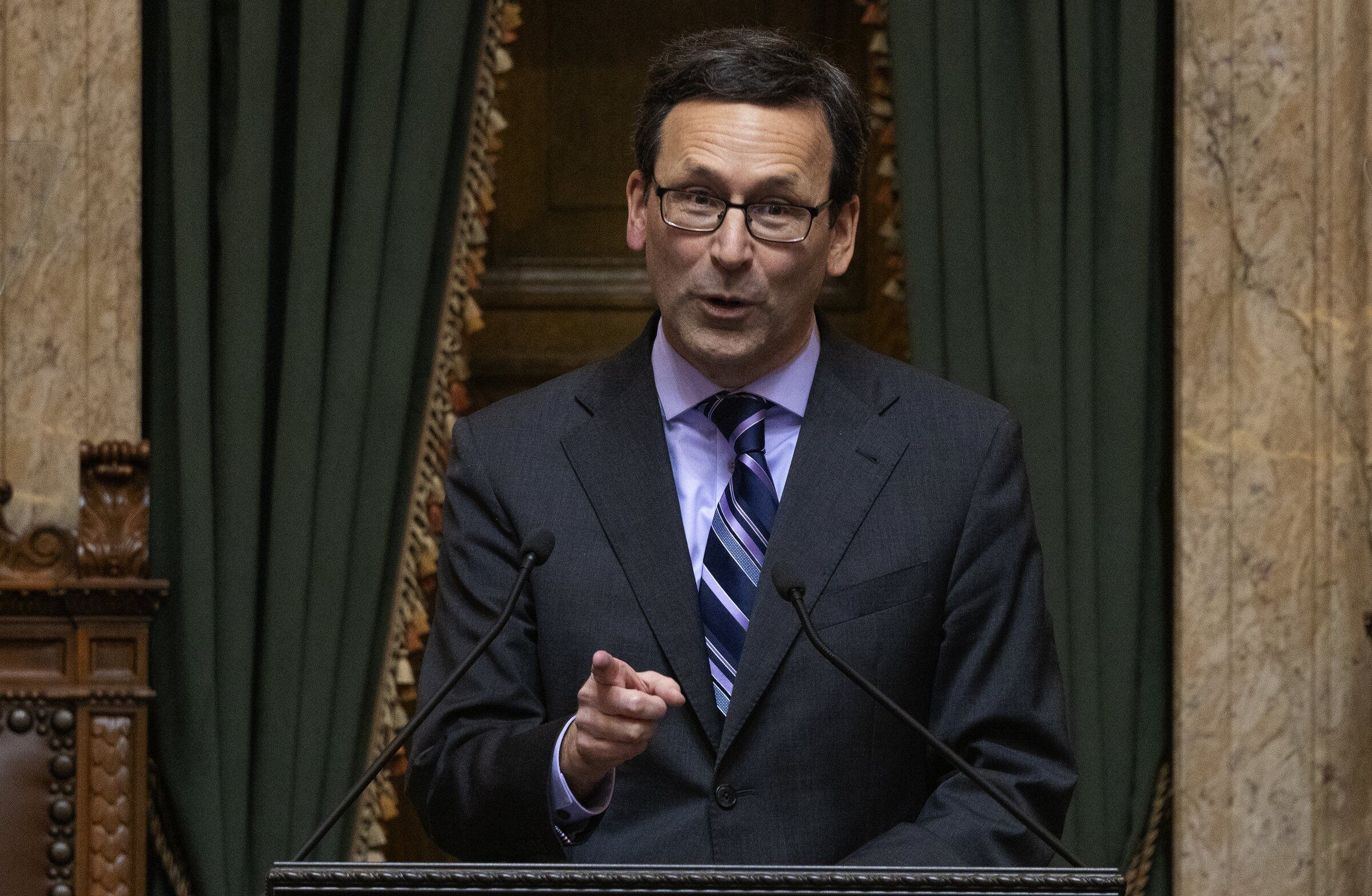 Gov. Bob Ferguson delivers the State of the State address to a joint session of lawmakers Jan. 13 in Olympia. (Ken Lambert / The Seattle Times)