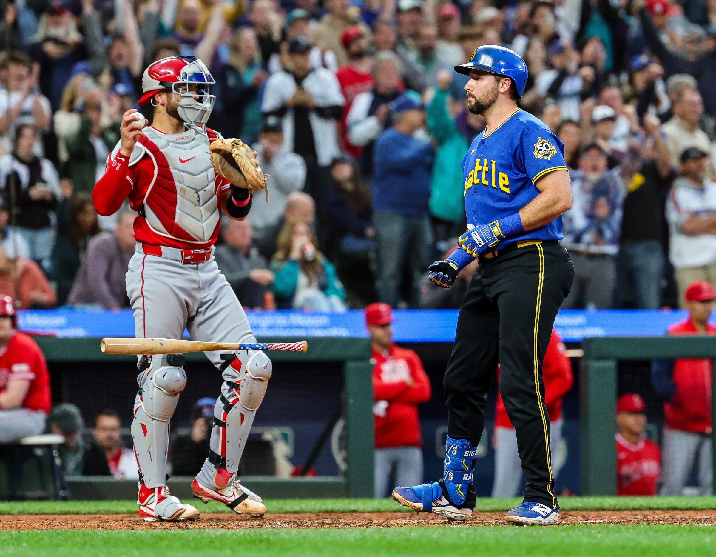 Cal Raleigh, facing 3–2 pitches with the bases loaded, advances to the sixth by coming in after scoring one run. On Thursday, July 2, 2026, at T-Mobile Park in Seattle, Washington, the Los Angeles Angels hosted the Seattle Mariners in Major League Baseball. (Dean Ratz / The Seattle Times)