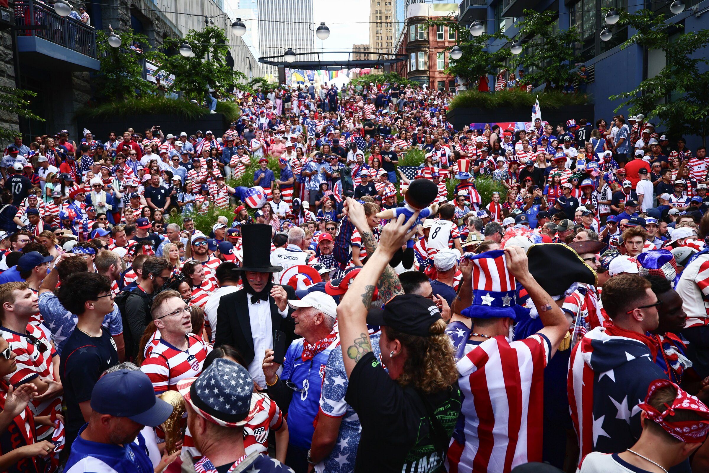 US national team fans gather before the match between the United States and Australia for a march from Harbor Steps to Seattle Stadium on June 19. The World Cup tournament—and visitors, party viewings, and events around it—seem to have given a new boost to dating in Seattle. (Kevin Clark / The Seattle Times)