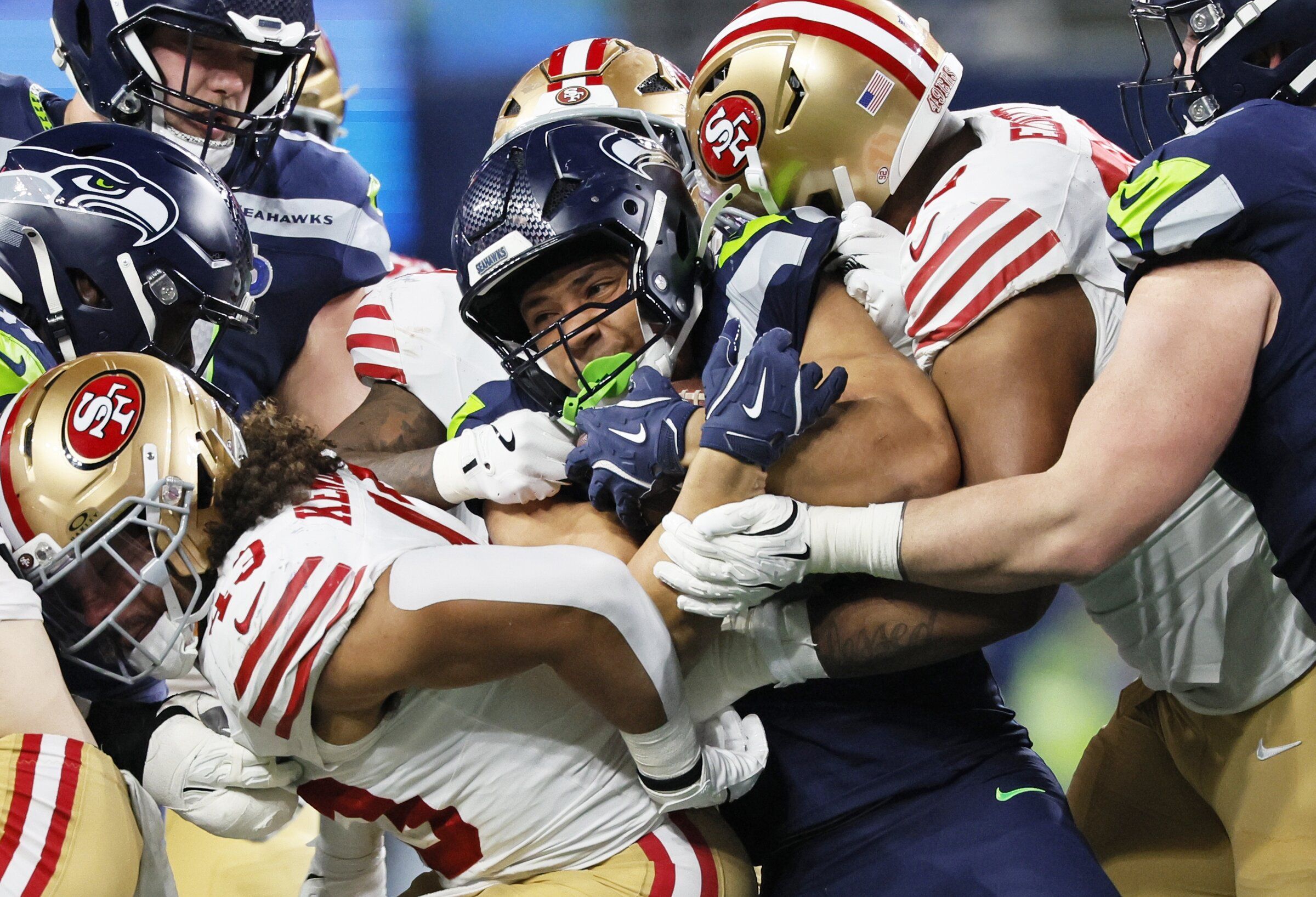 Seattle Seahawks running back Zach Charbonnet is stopped during the NFC divisional playoffs against the San Francisco 49ers, Jan. 17, 2026, in Seattle. (Jennifer Buchanan / The Seattle Times)