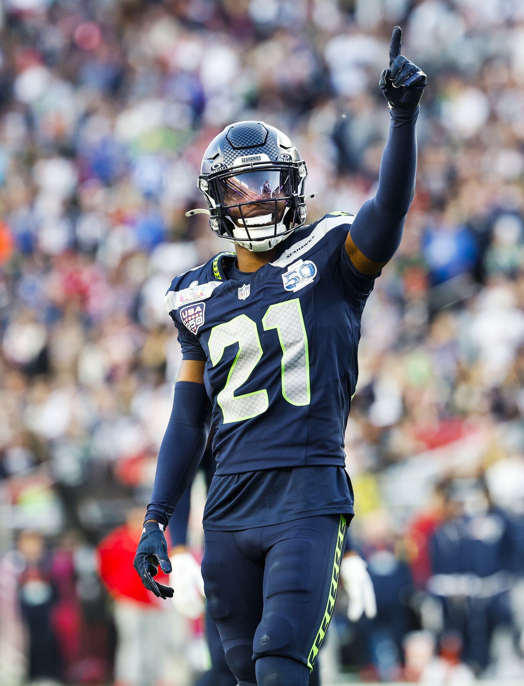 Seahawks cornerback Devon Witherspoon (21) celebrates a play during the Super Bowl. (Dean Rutz / The Seattle Times)