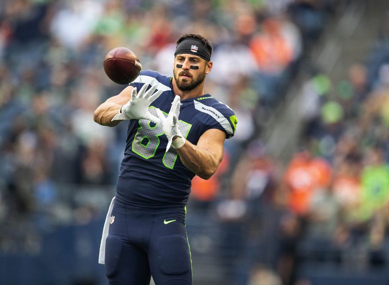 Seahawks bring back tight end as veterans report for training camp | The  Seattle Times