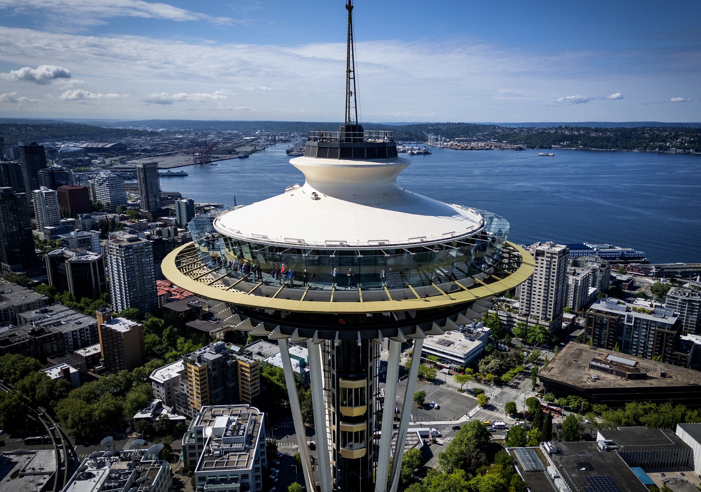 The Space Needle, seen from the air. On Friday night, two men parachuted from the structure. (Ken Lambert / The Seattle Times, 2025)