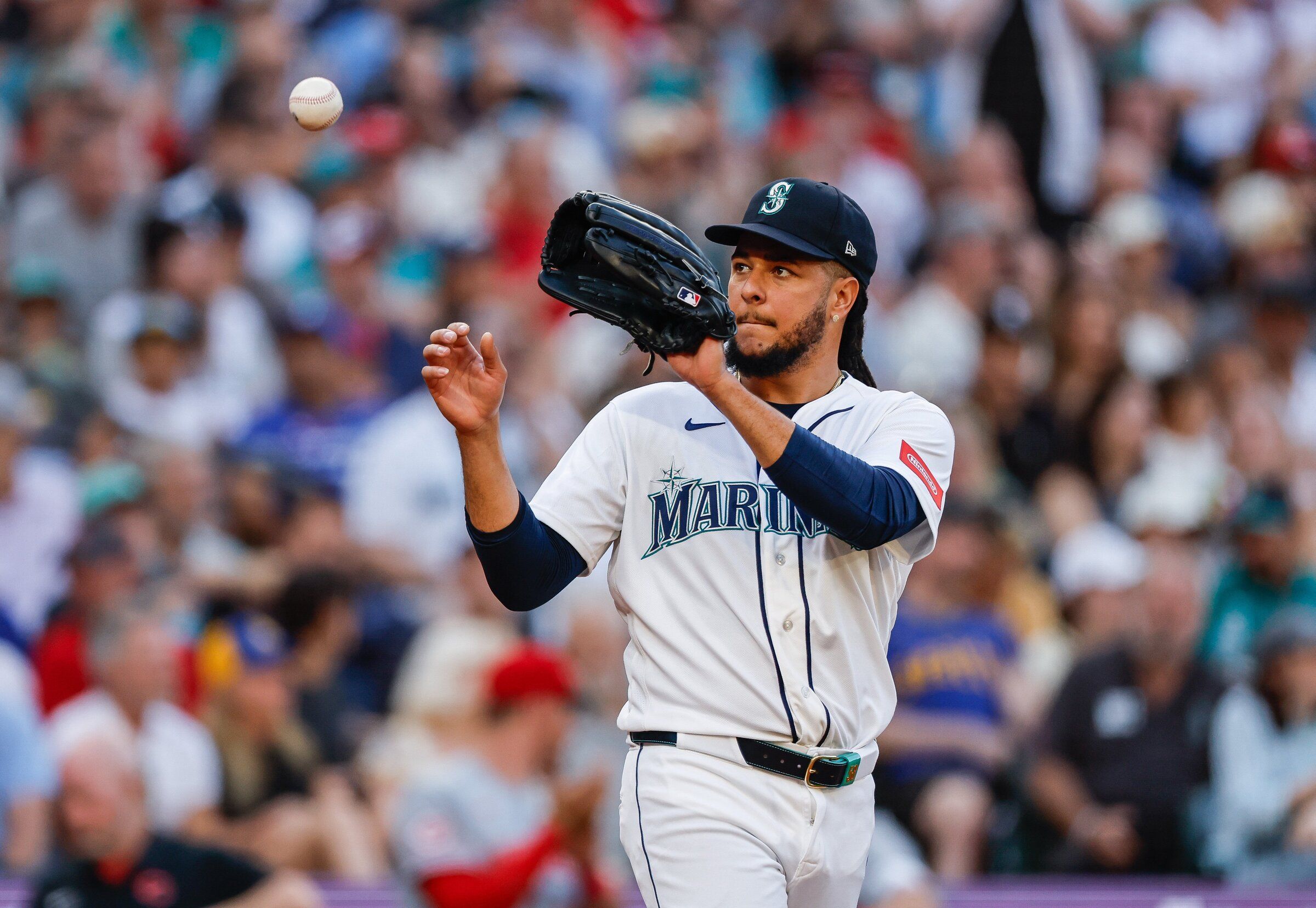 Seattle Mariners starting pitcher Luis Castillo gets a new ball after Cincinnati Reds’ Sal Stewart hit a sacrifice fly in the fifth inning, July 21, 2026, in Seattle. (Dean Rutz / The Seattle Times)