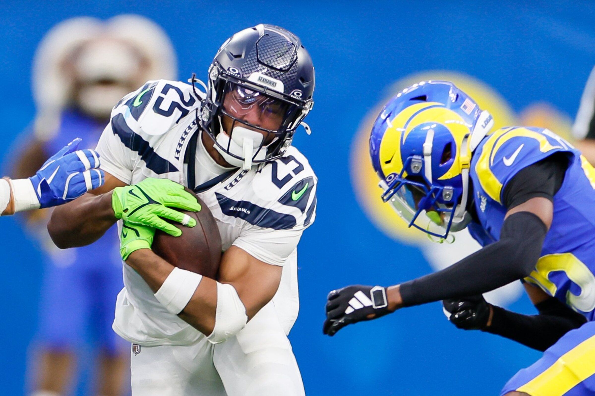 Rams cornerback Emmanuel Forbes Jr. lines up a hit on Seahawks running back Kenny McIntosh in 2025. (Jennifer Buchanan / The Seattle Times)