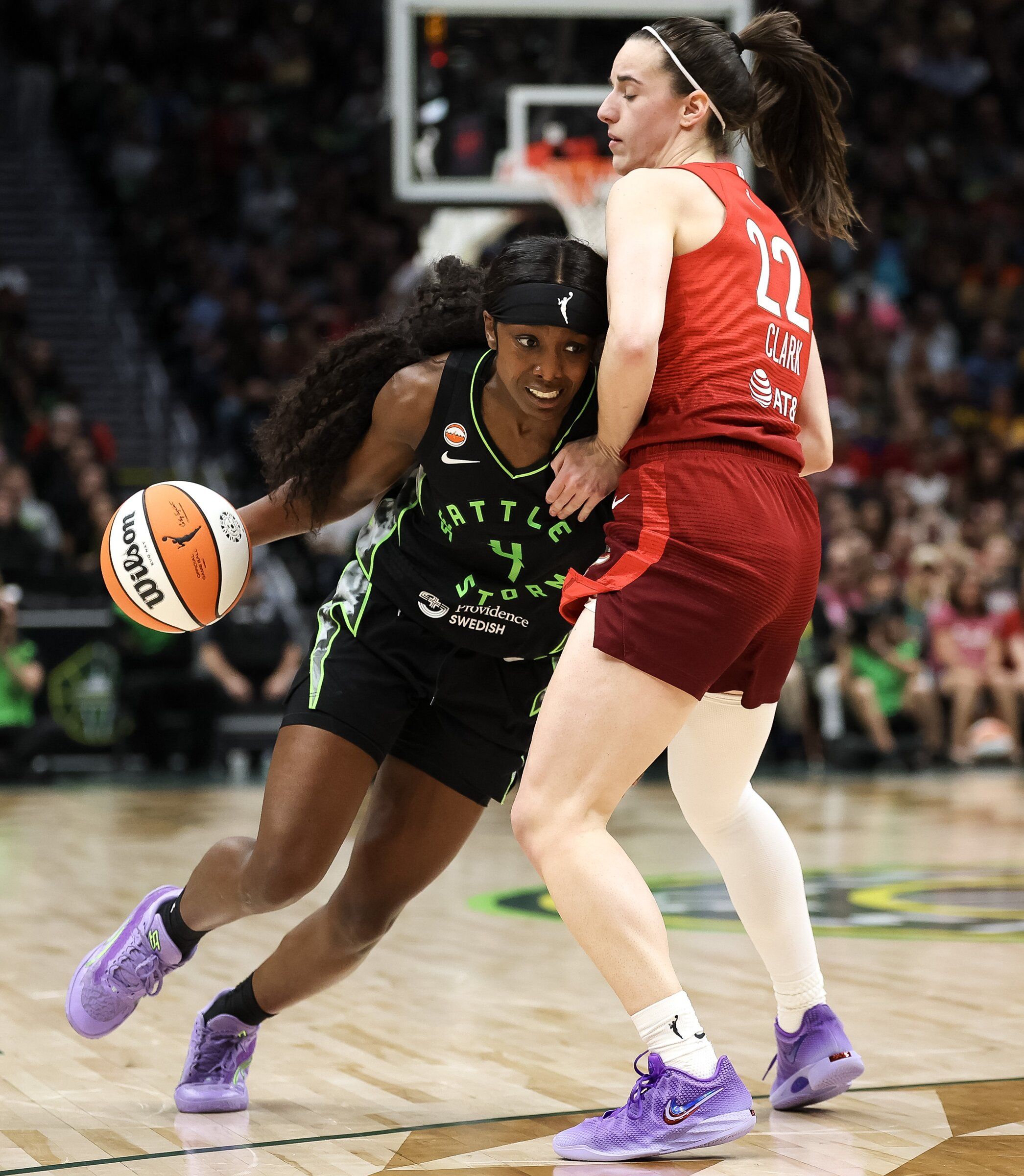 Caitlin Clark leads Indiana Fever past Seattle Storm with 32 points in 105-95 victory; Fever set WNBA record with fourth straight 100-point game