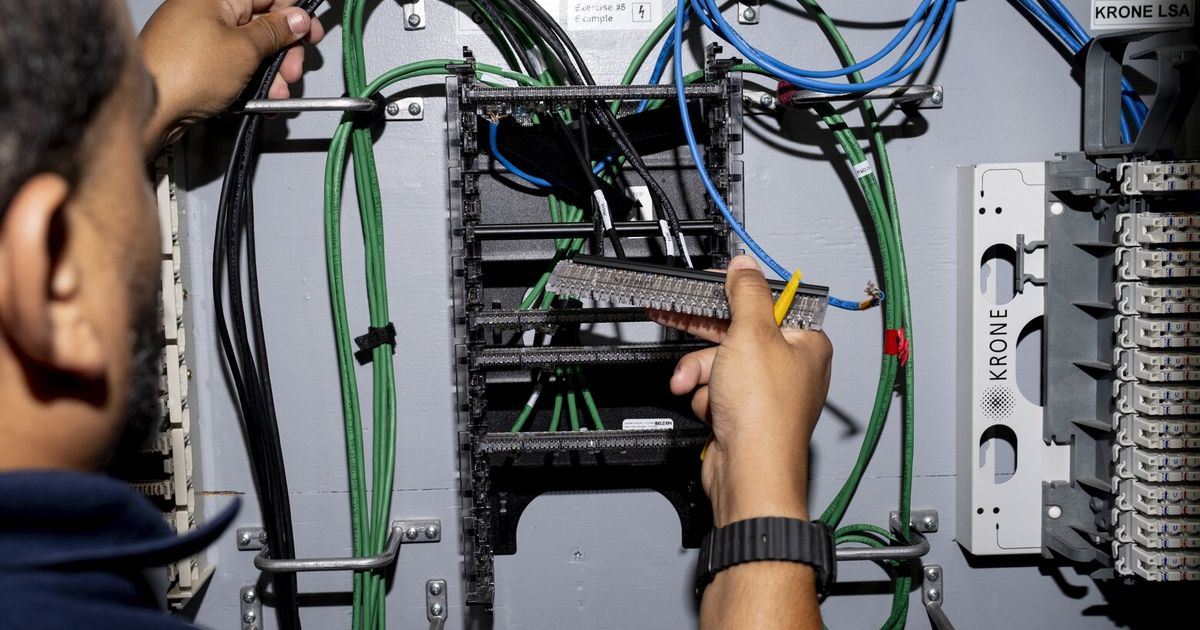AI companies are recruiting electricians and carpenters by the thousands